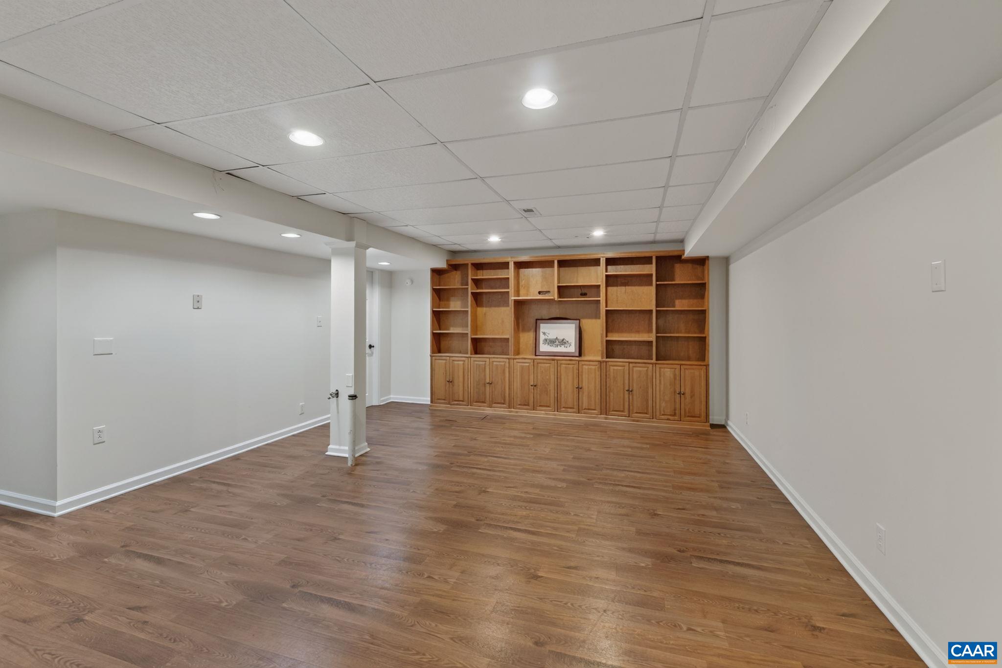 Rough-in for a Wet Bar & utility room beyond. There is also a secret space behind this bookcase. Rough-in for a Wet Bar & utility room beyond. There is also a secret space behind this bookcase.