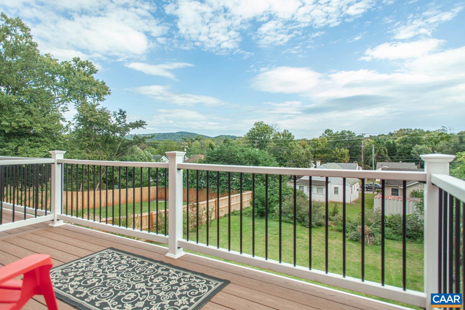 Cozy deck overlooking the yard. Cozy deck overlooking the yard.