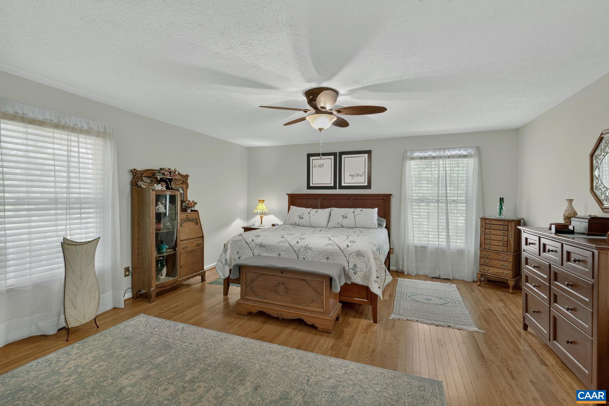This spacious bedroom is on the first level with plenty of natural light.