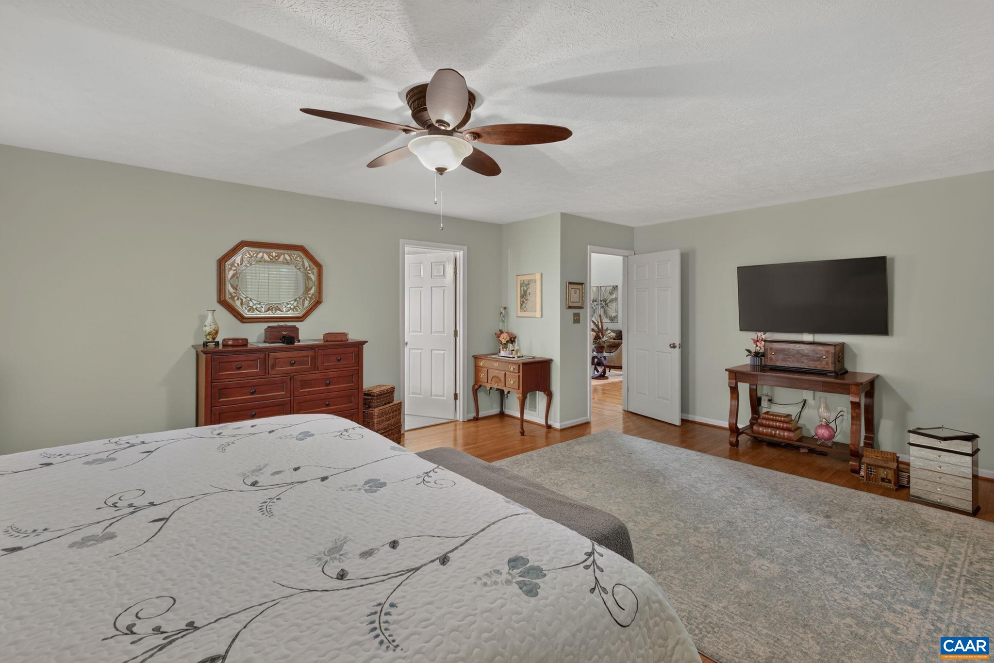 Showing views into the large Primary Bath and the Great Room.