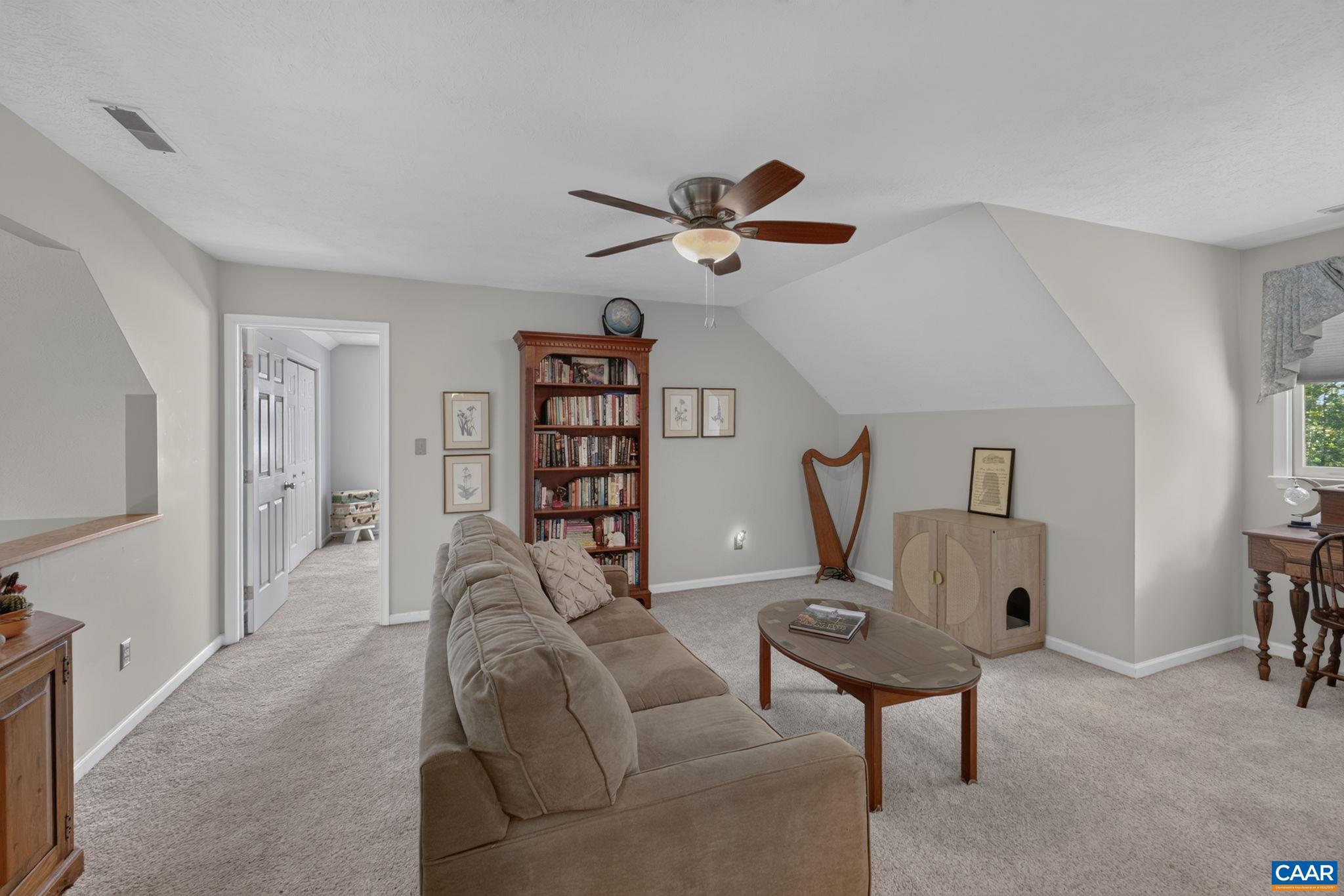 This spacious area can be used as an office, play area, gathering space or whatever your heart desires.  There is a secondary bedroom on each side of the loft plus a full bath.