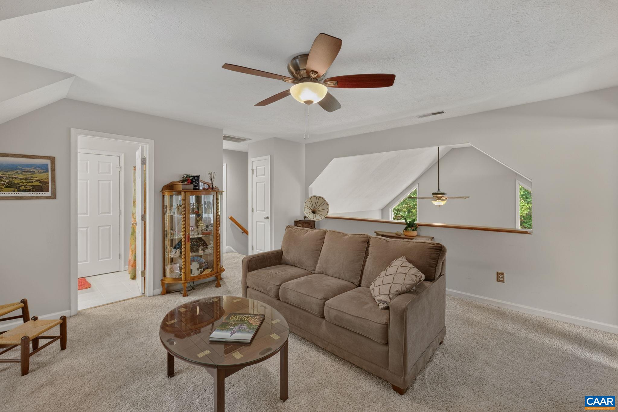 Showing doorway into Full Bath and stairway down to the first level.