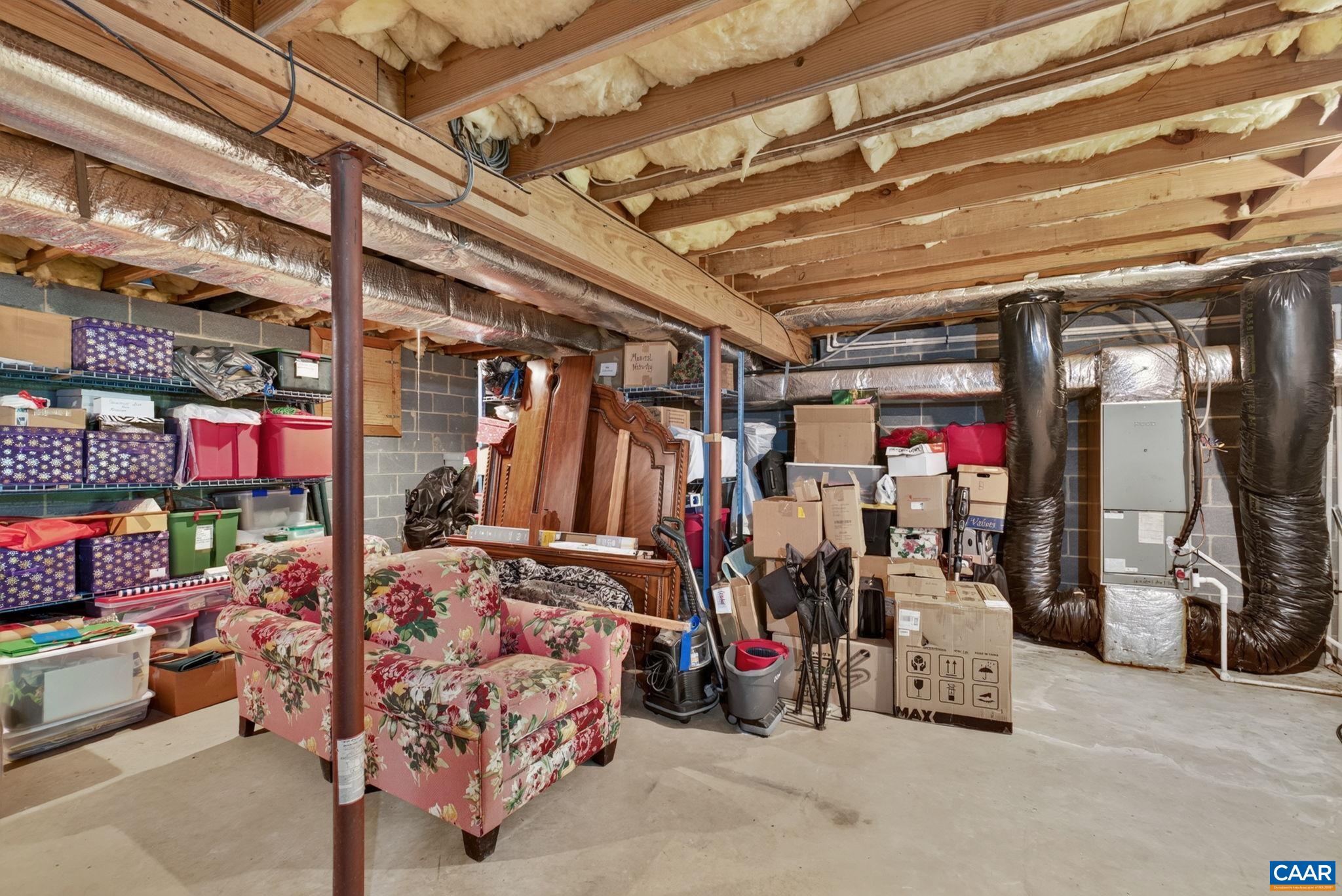 There is storage area galore in the unfinished section of this walk out basement.  A flue, plus clean out, is in this area, that could easily be finished, should you desire to do so.