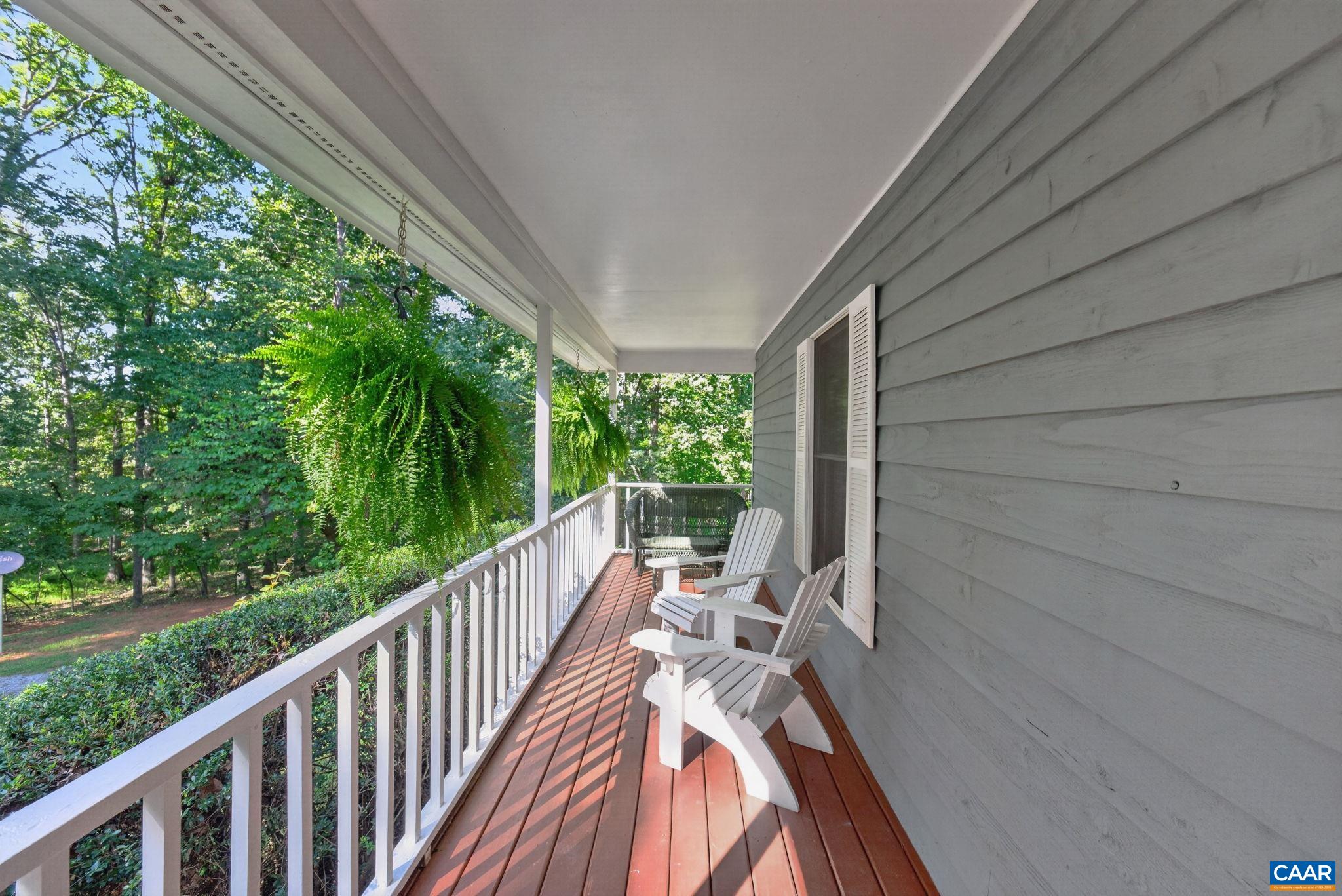Front Porch extends across the entire front of the house. You are able to see mountain views from here as well as spectacular sunsets.