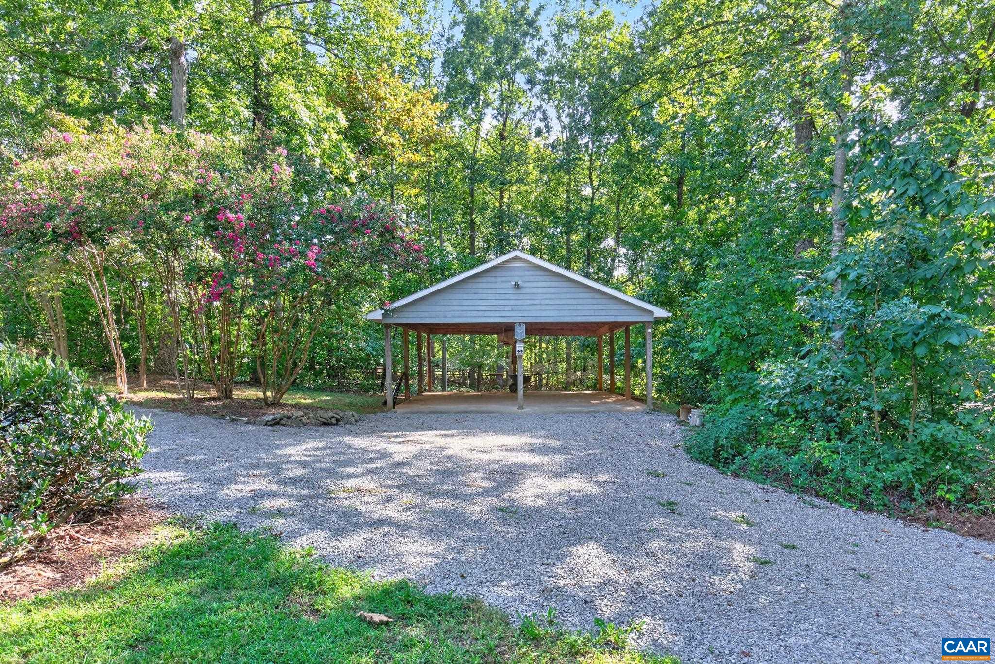 This over sized carport was built so that it could be enclosed in the future.  It could be used as a carport, pavilion, play area or whatever.