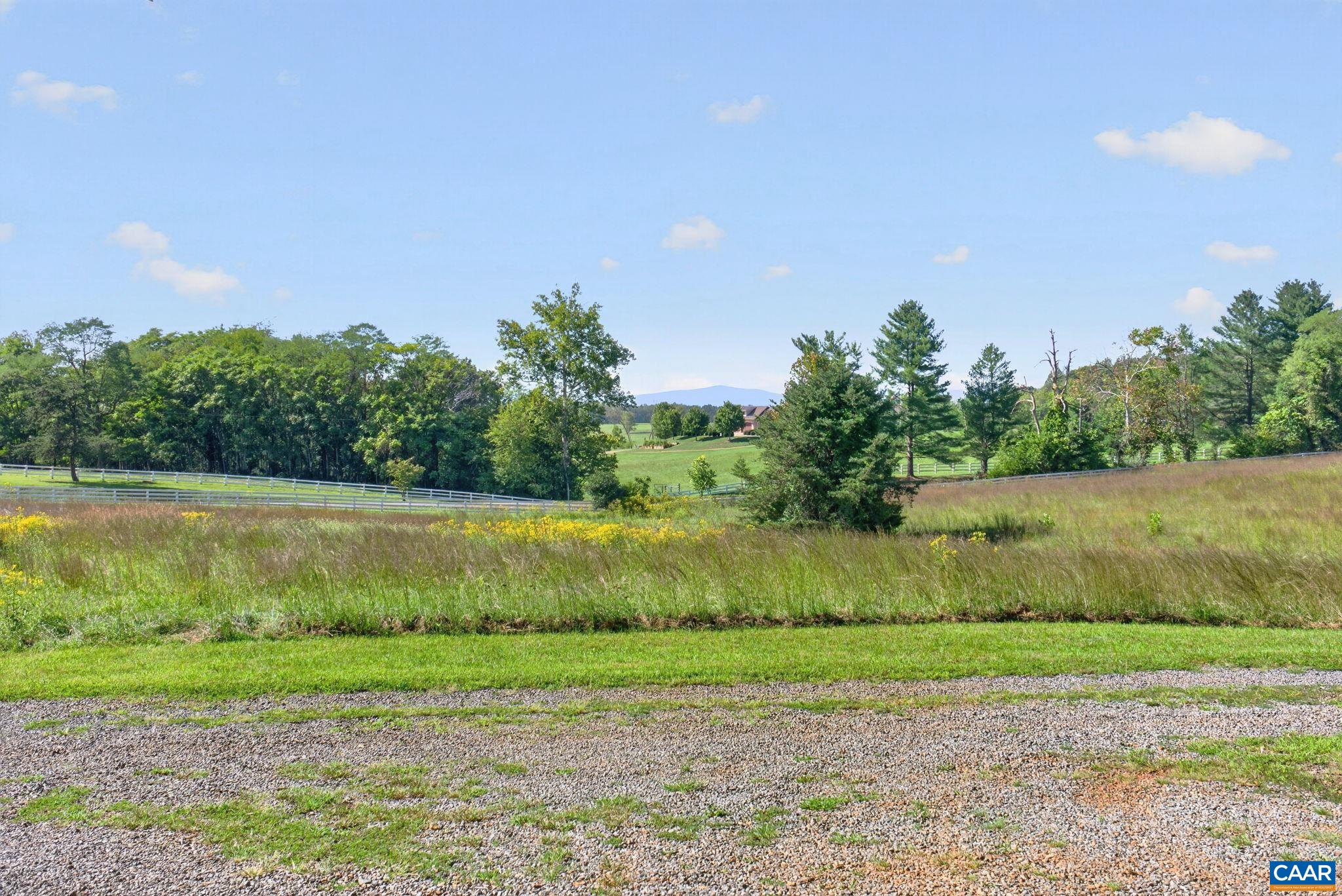 This hay field adjoins the neighbor. There is also an easement allowing this one neighbor to access his property from subject property.  Neighbor also has another entrance off of Echo Valley Rd.