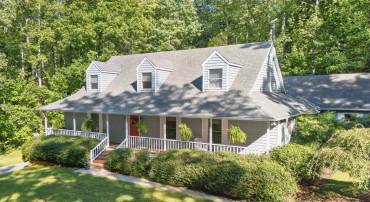 A welcoming view of this Cape Cod style home.