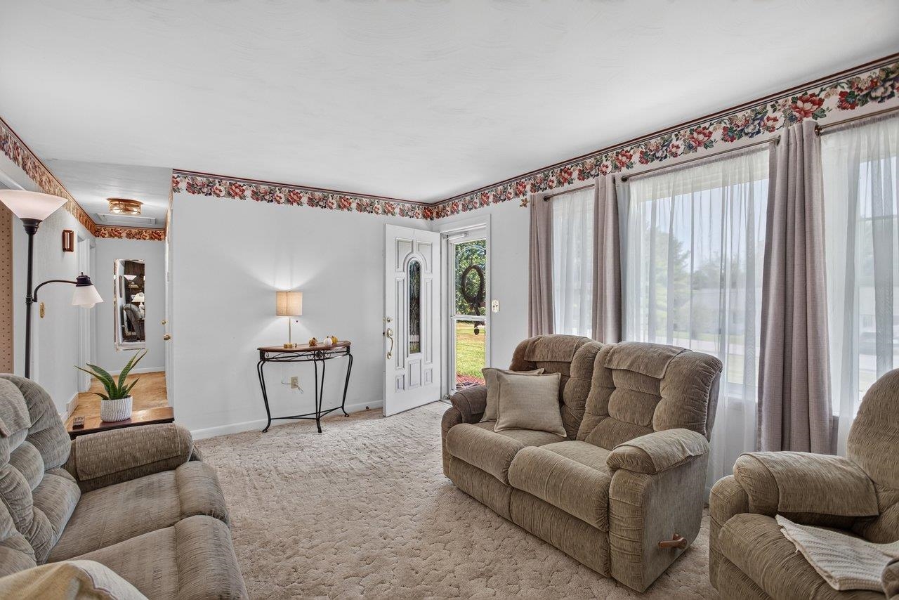 Bright, inviting living room filled with natural light. Bright, inviting living room filled with natural light.