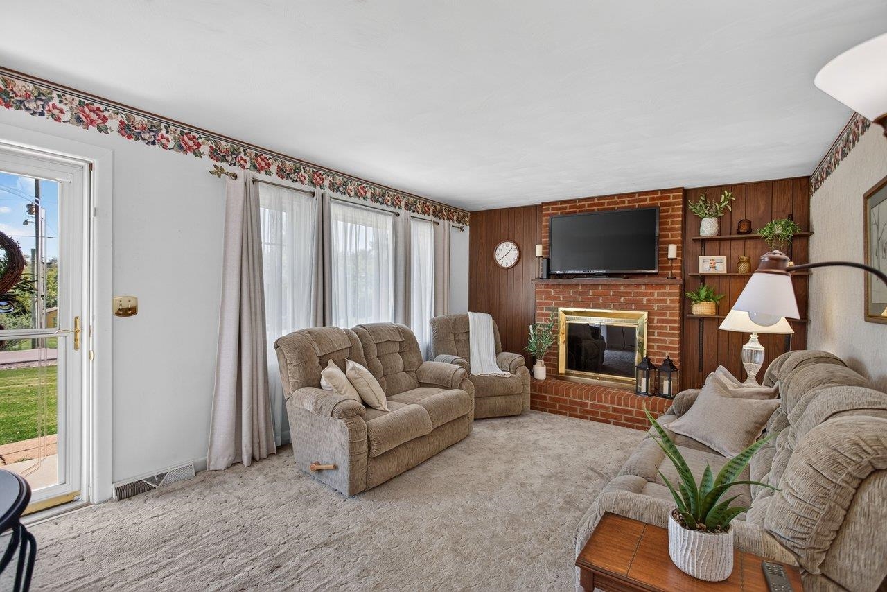 Cozy wood-burning fireplace, perfect for chilly evenings. Cozy wood-burning fireplace, perfect for chilly evenings.