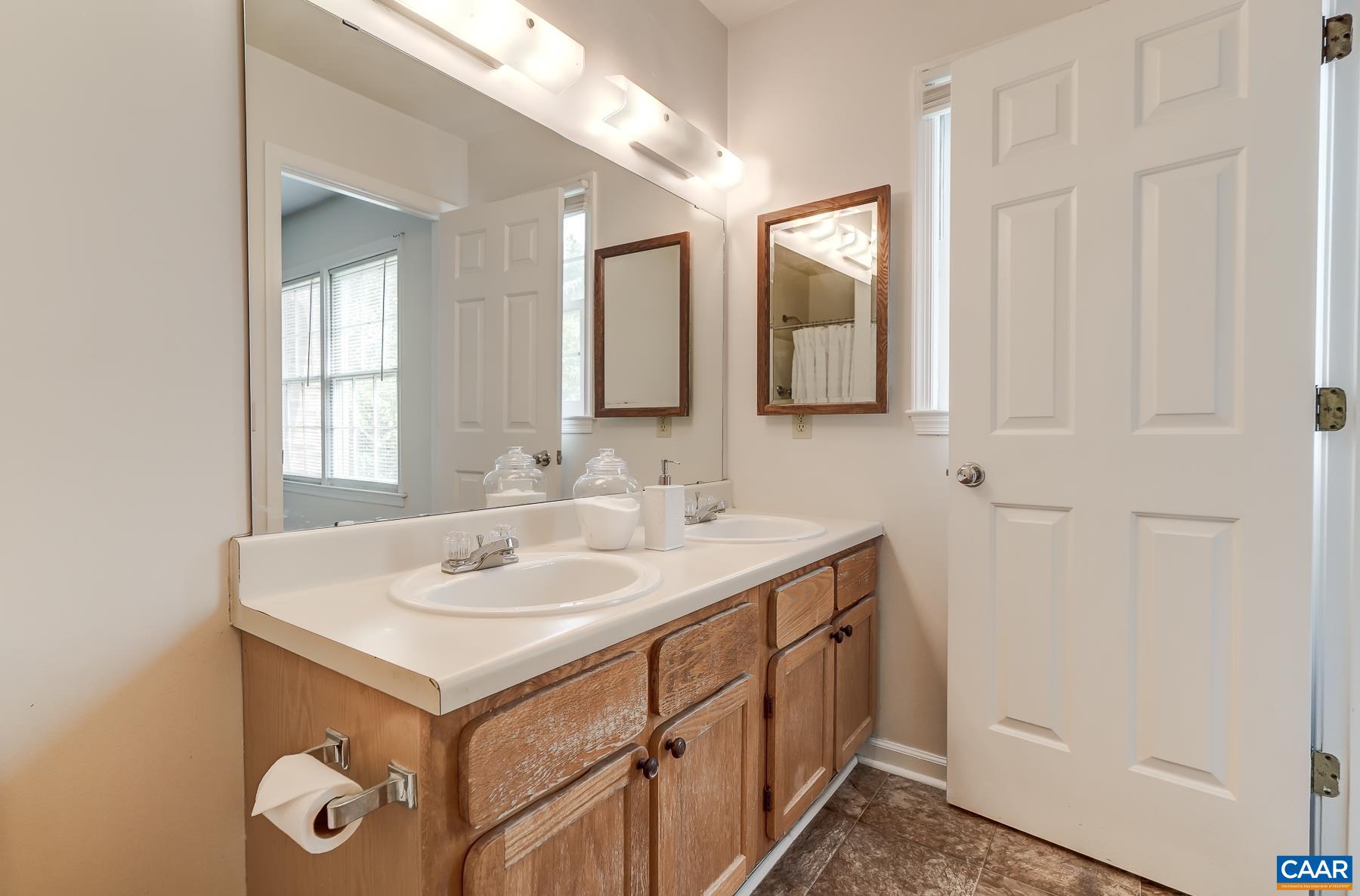 Double sink vanity in primary bathroom