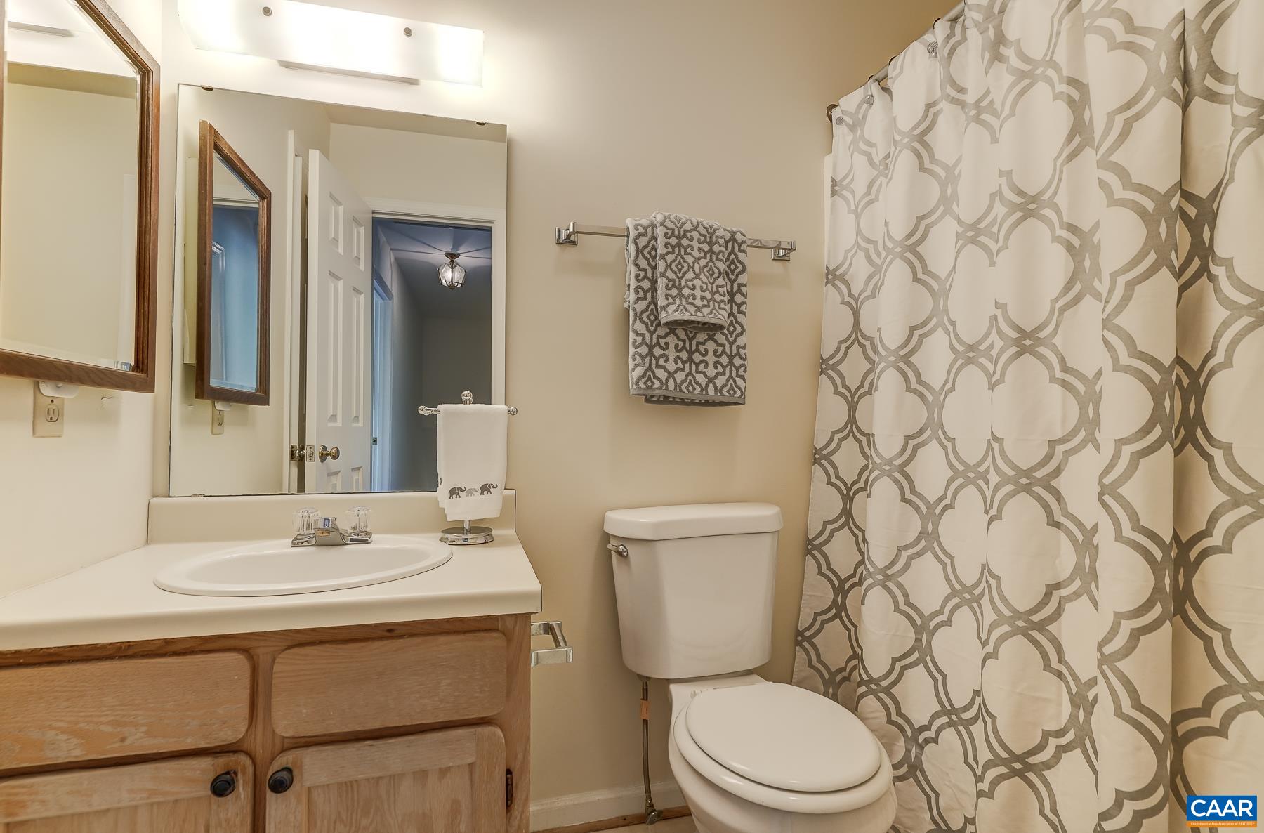Hall bathroom with tub/shower.