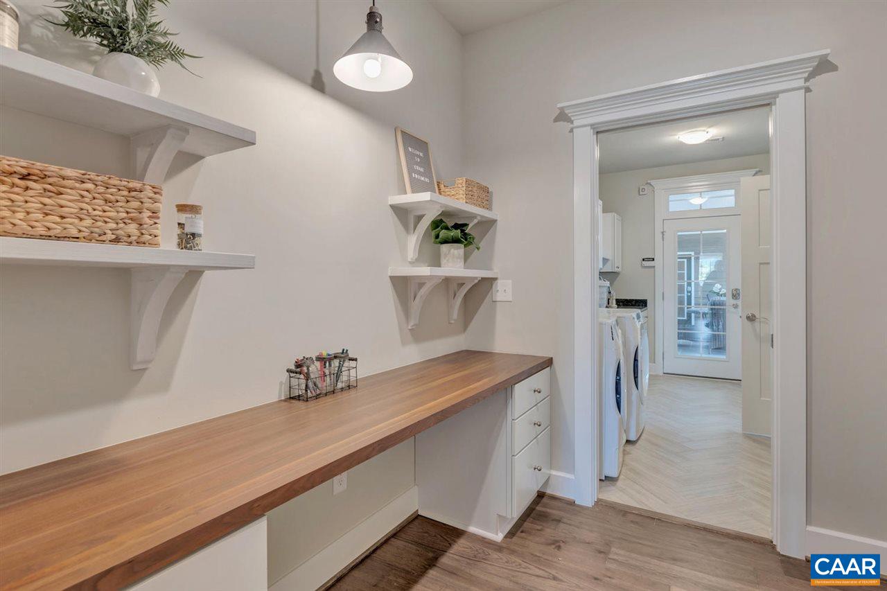 Custom home office off Mud Room/Owner's suite