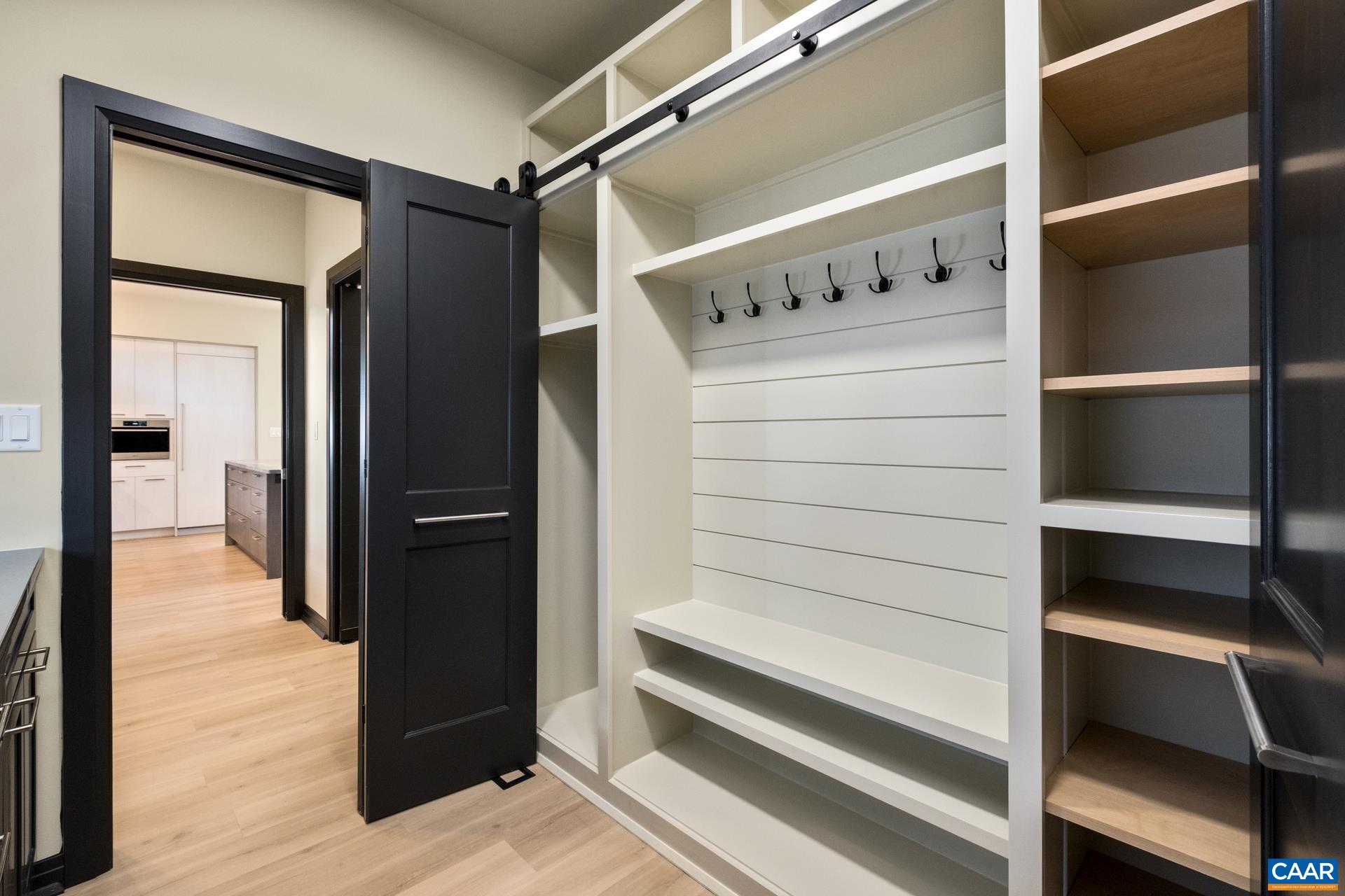 Mudroom with built in bench and storage.
