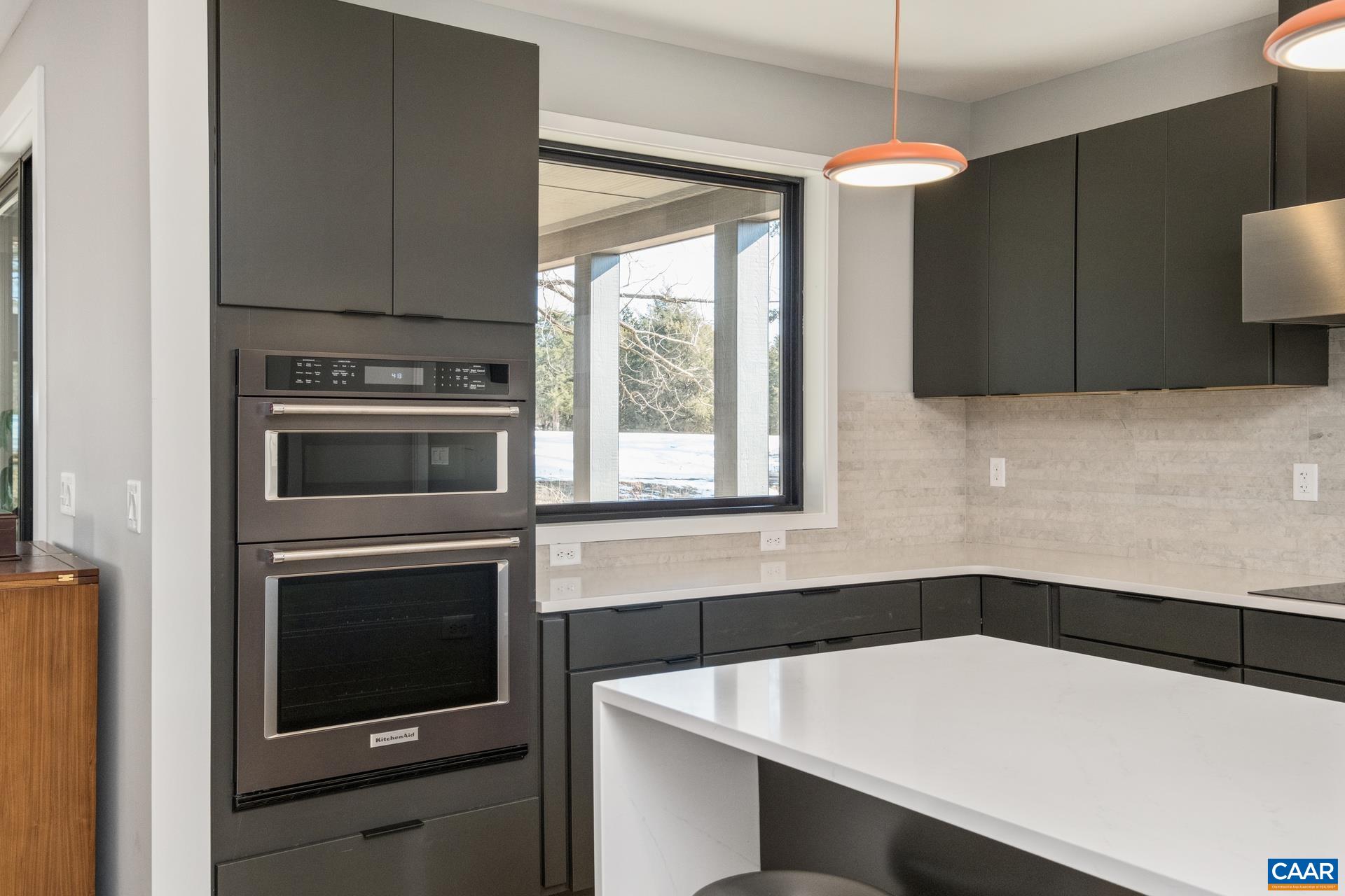 Practical and polished design with wall oven/microwave combo