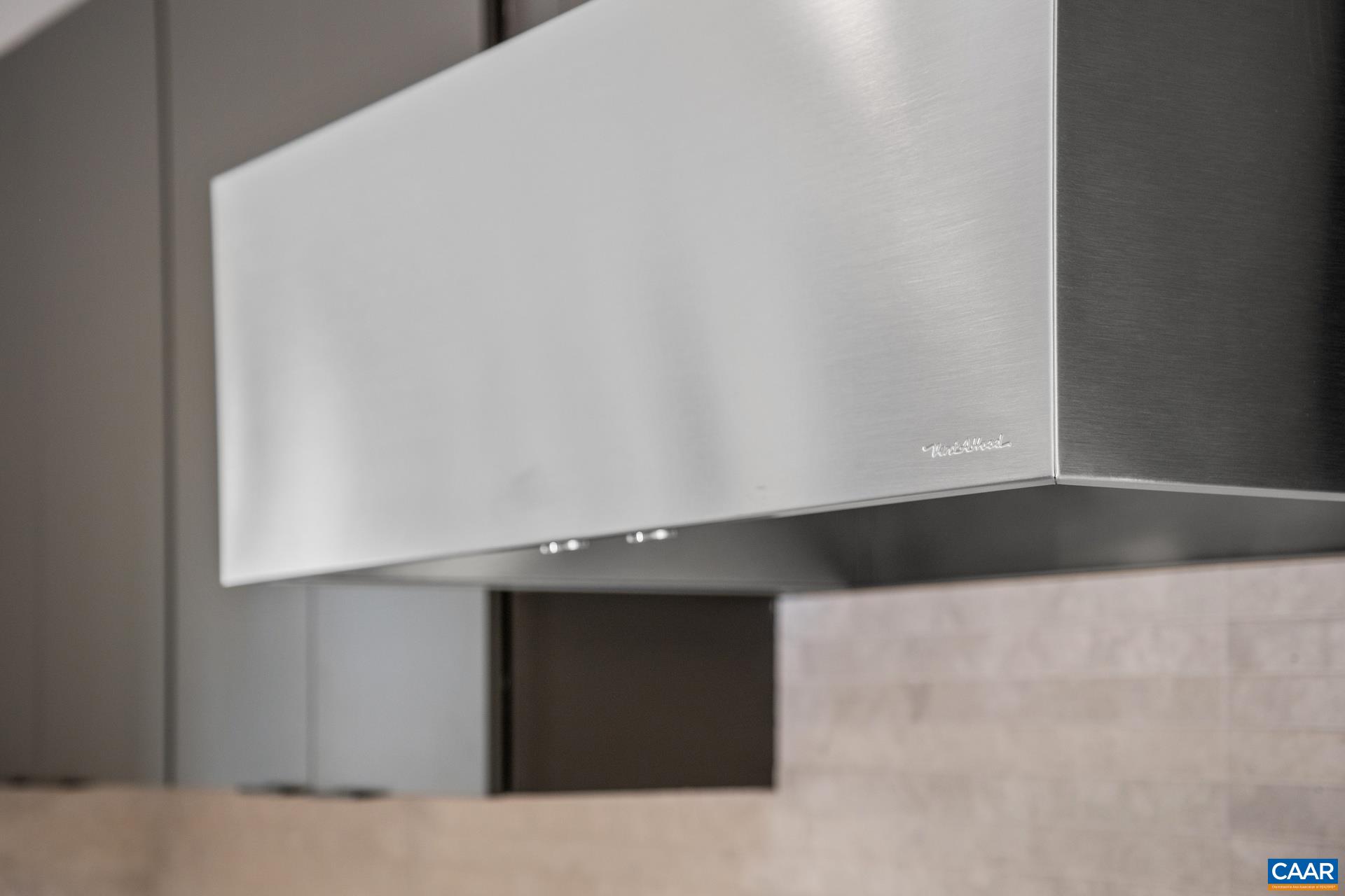 Stunning range hood.