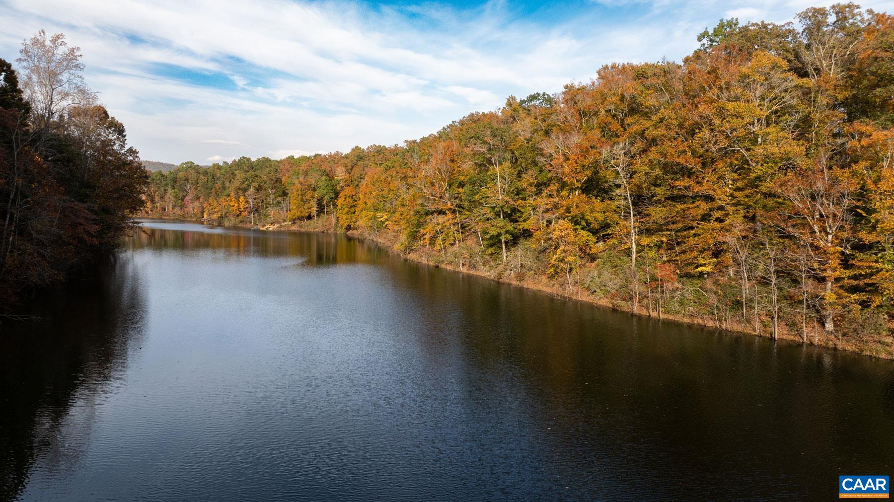 Lake level, looking north along the east shore. Over 1,300 feet of frontage. Lake level, looking north along the east shore. Over 1,300 feet of frontage.