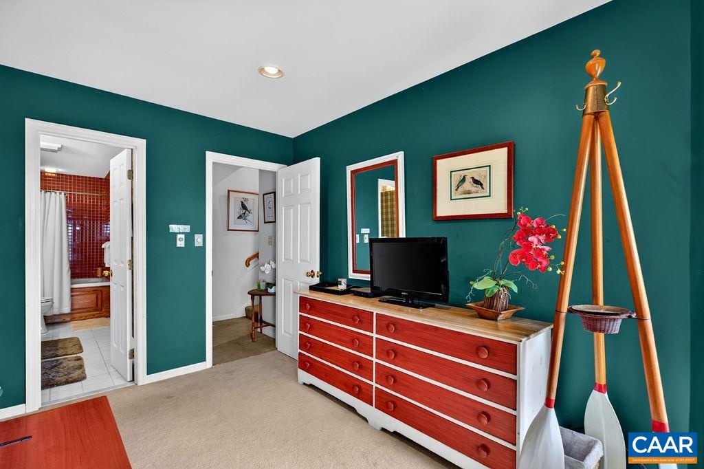 The primary bedroom also features a walk-in closet, providing plenty of additional storage.