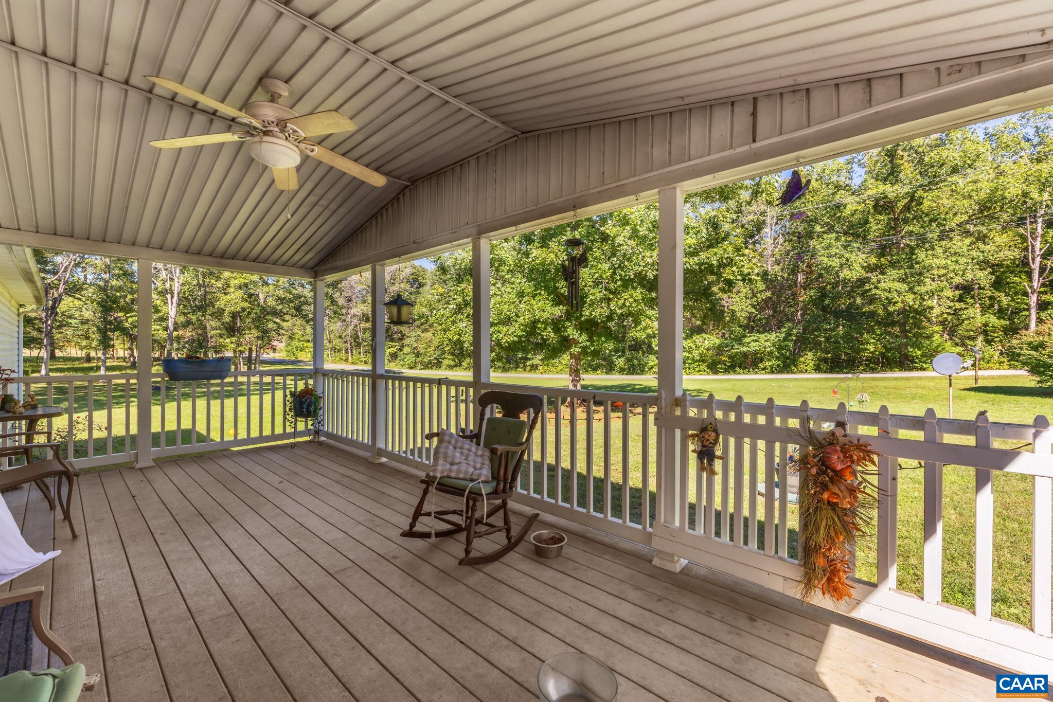 Enjoy peaceful country living from this beautiful covered porch! Nestled on 2 lots totaling 6.73 acres, this spacious 1,891 sq ft home offers expansive open views, serene natural surroundings, and endless space to relax, entertain, and grow. Enjoy peaceful country living from this beautiful covered porch! Nestled on 2 lots totaling 6.73 acres, this spacious 1,891 sq ft home offers expansive open views, serene natural surroundings, and endless space to relax, entertain, and grow.