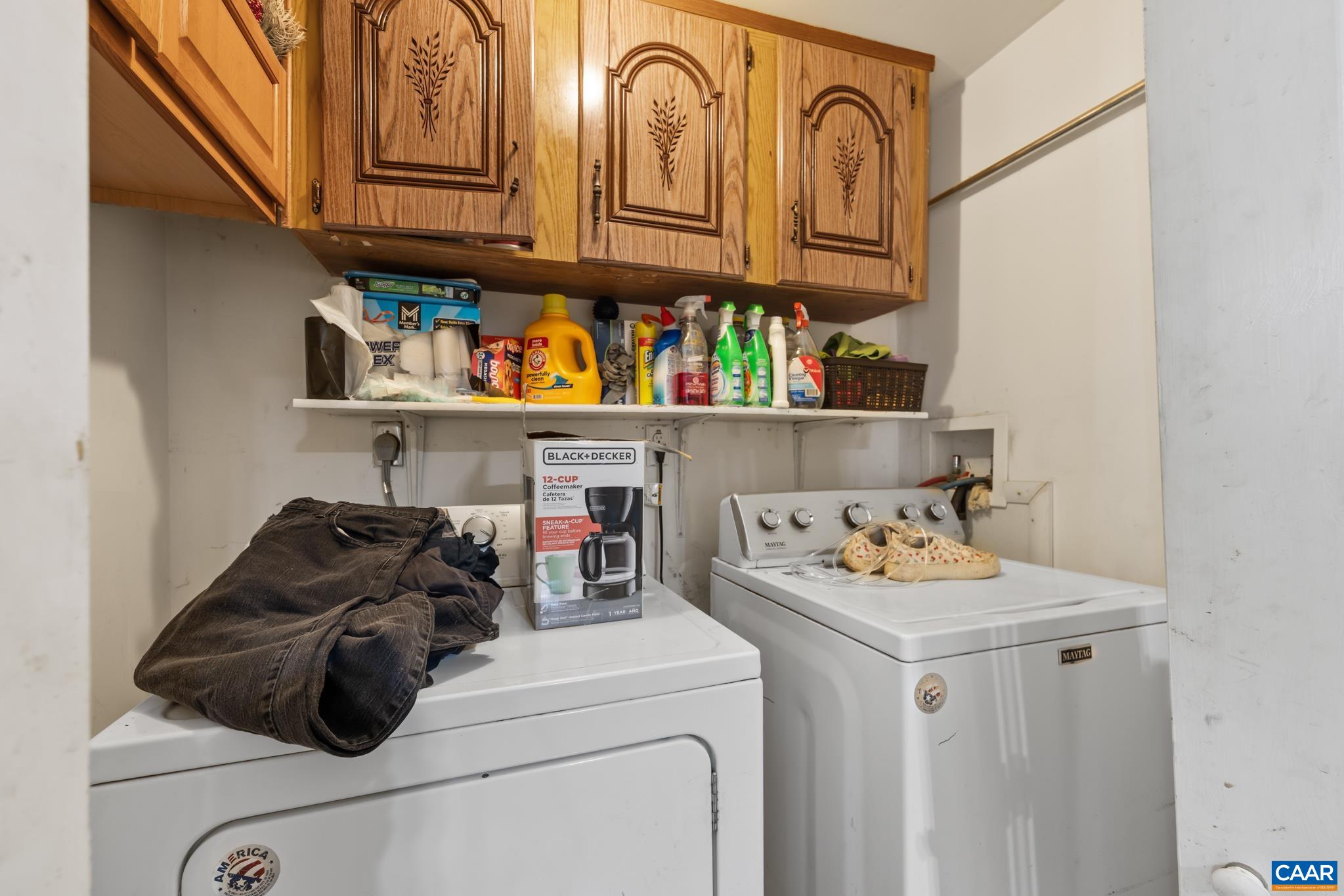 Simplify laundry day with this functional laundry room, complete with an included washer and dryer! Overhead cabinets and open shelving provide ample storage space to keep detergent, supplies, and essentials neatly organized and close at hand. Simplify laundry day with this functional laundry room, complete with an included washer and dryer! Overhead cabinets and open shelving provide ample storage space to keep detergent, supplies, and essentials neatly organized and close at hand.