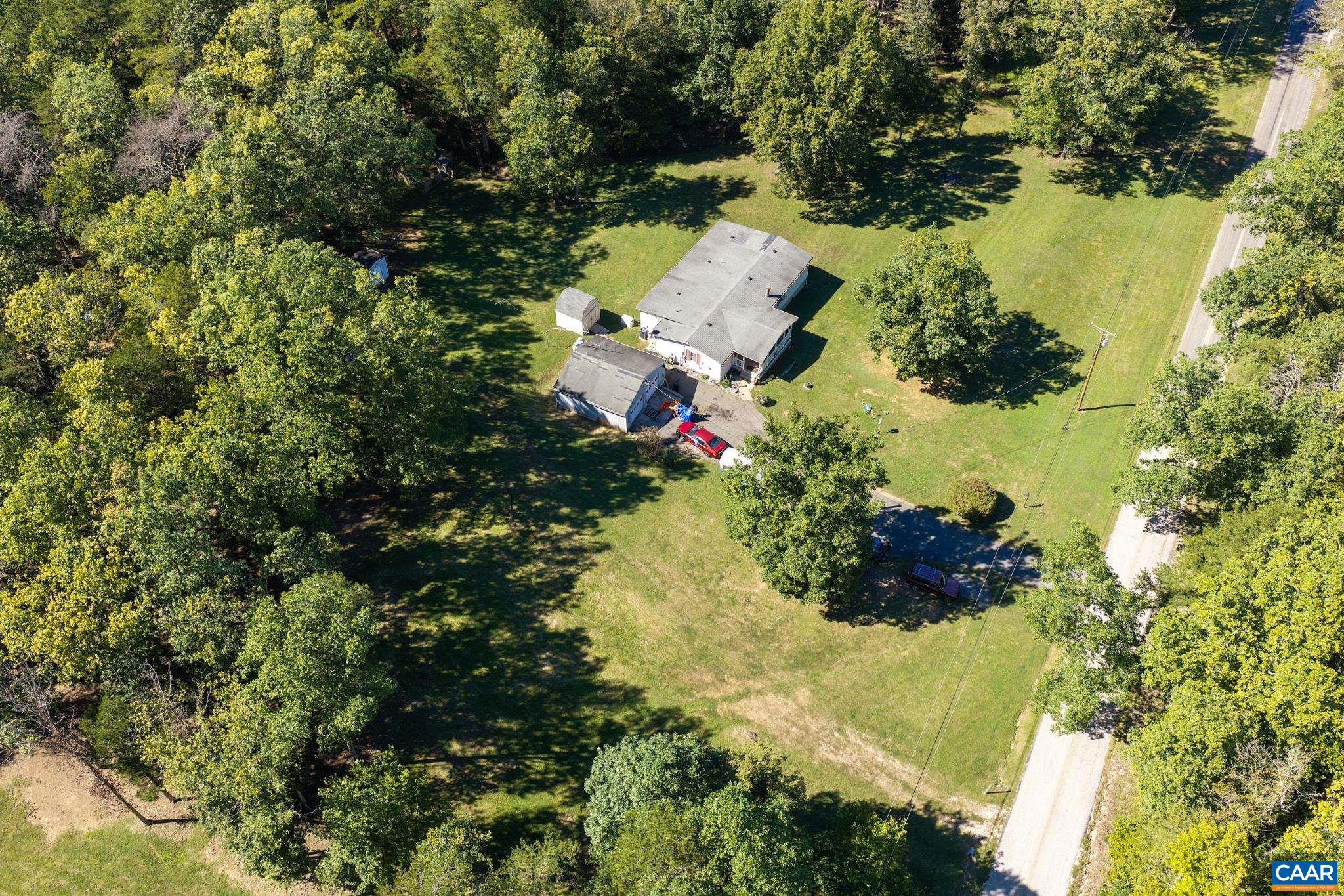 Set on 3.28 serene acres at 74 Aerial Dr with an adjacent, pre-subdivided 3.45-acre lot at 96 Aerial Dr, this property offers incredible versatility. Build a private family compound, add a rental investment, or enjoy expansive country space! Set on 3.28 serene acres at 74 Aerial Dr with an adjacent, pre-subdivided 3.45-acre lot at 96 Aerial Dr, this property offers incredible versatility. Build a private family compound, add a rental investment, or enjoy expansive country space!