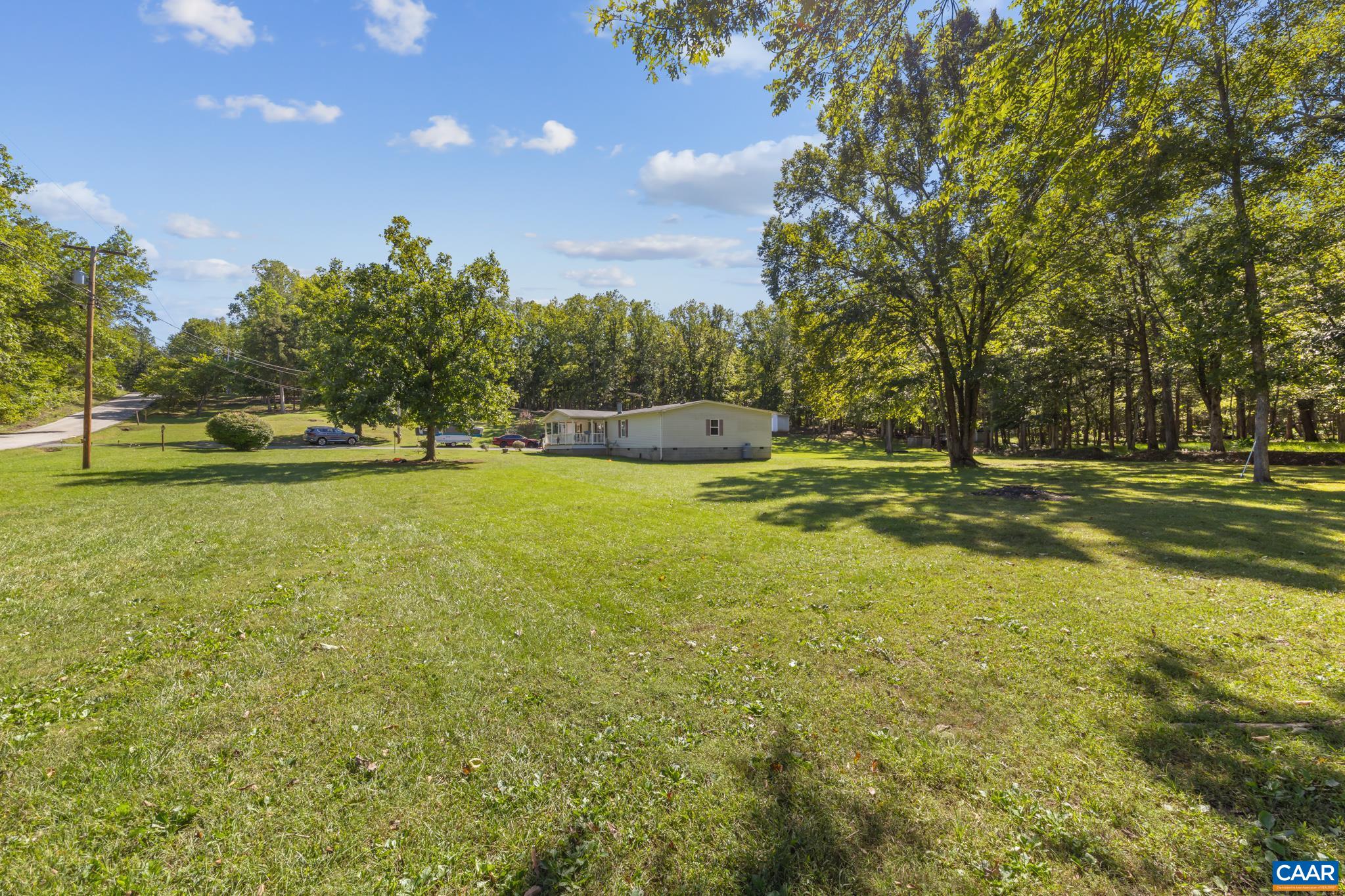Set on 3.28 serene acres at 74 Aerial Dr with an adjacent, pre-subdivided 3.45-acre lot at 96 Aerial Dr, this property offers incredible versatility. Build a private family compound, add a rental investment, or enjoy expansive country space! Set on 3.28 serene acres at 74 Aerial Dr with an adjacent, pre-subdivided 3.45-acre lot at 96 Aerial Dr, this property offers incredible versatility. Build a private family compound, add a rental investment, or enjoy expansive country space!