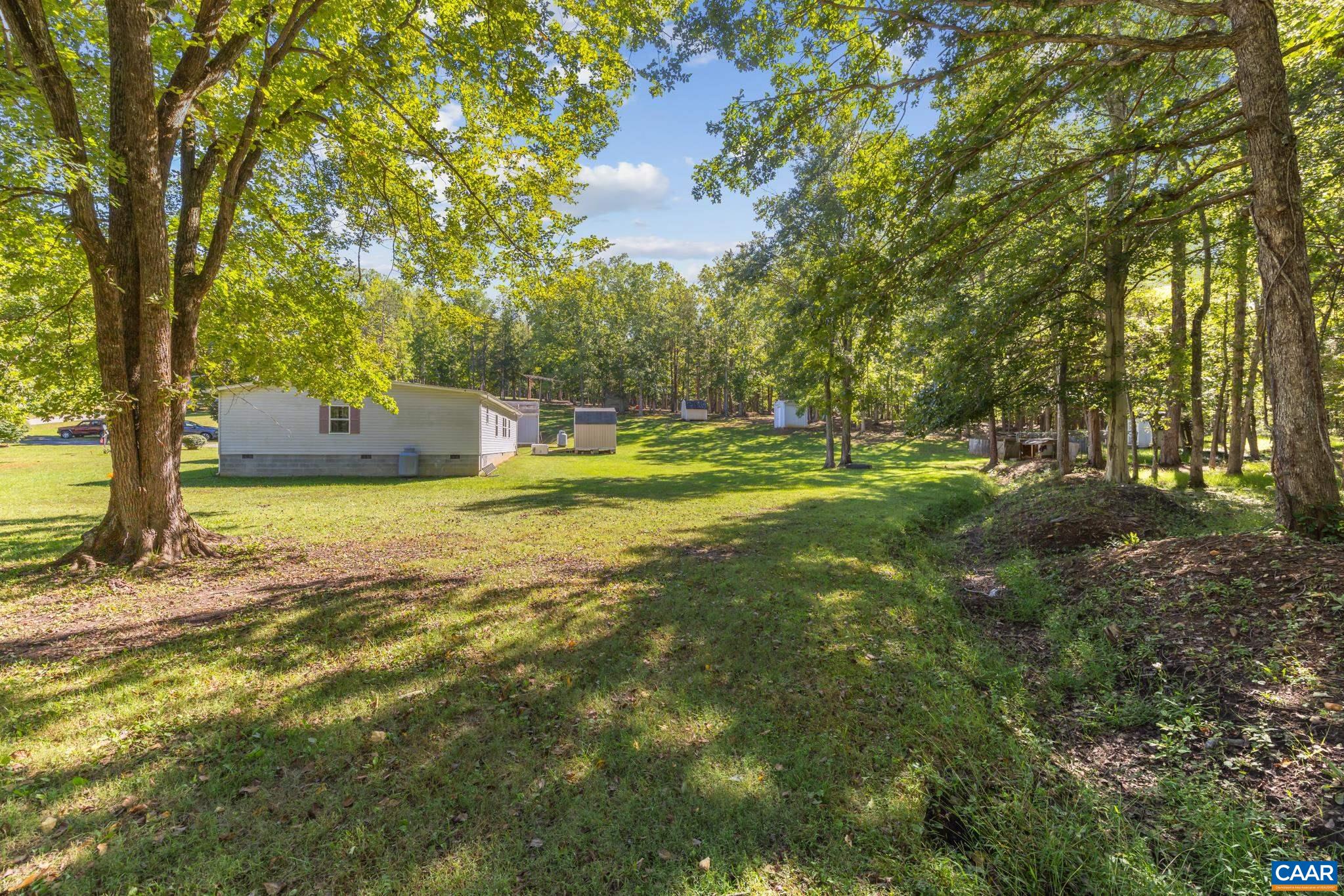 Set on 3.28 serene acres at 74 Aerial Dr with an adjacent, pre-subdivided 3.45-acre lot at 96 Aerial Dr, this property offers incredible versatility. Build a private family compound, add a rental investment, or enjoy expansive country space! Set on 3.28 serene acres at 74 Aerial Dr with an adjacent, pre-subdivided 3.45-acre lot at 96 Aerial Dr, this property offers incredible versatility. Build a private family compound, add a rental investment, or enjoy expansive country space!