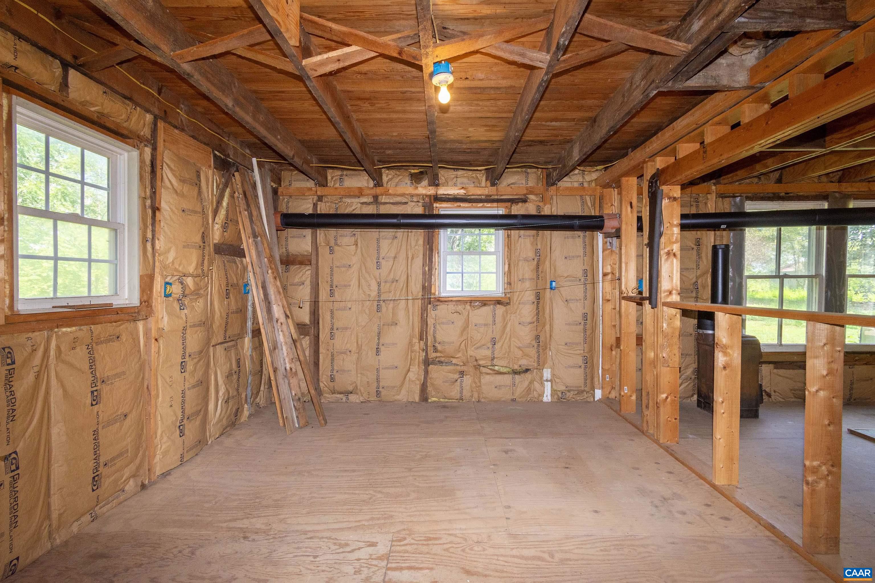 Room at rear, right side of house.