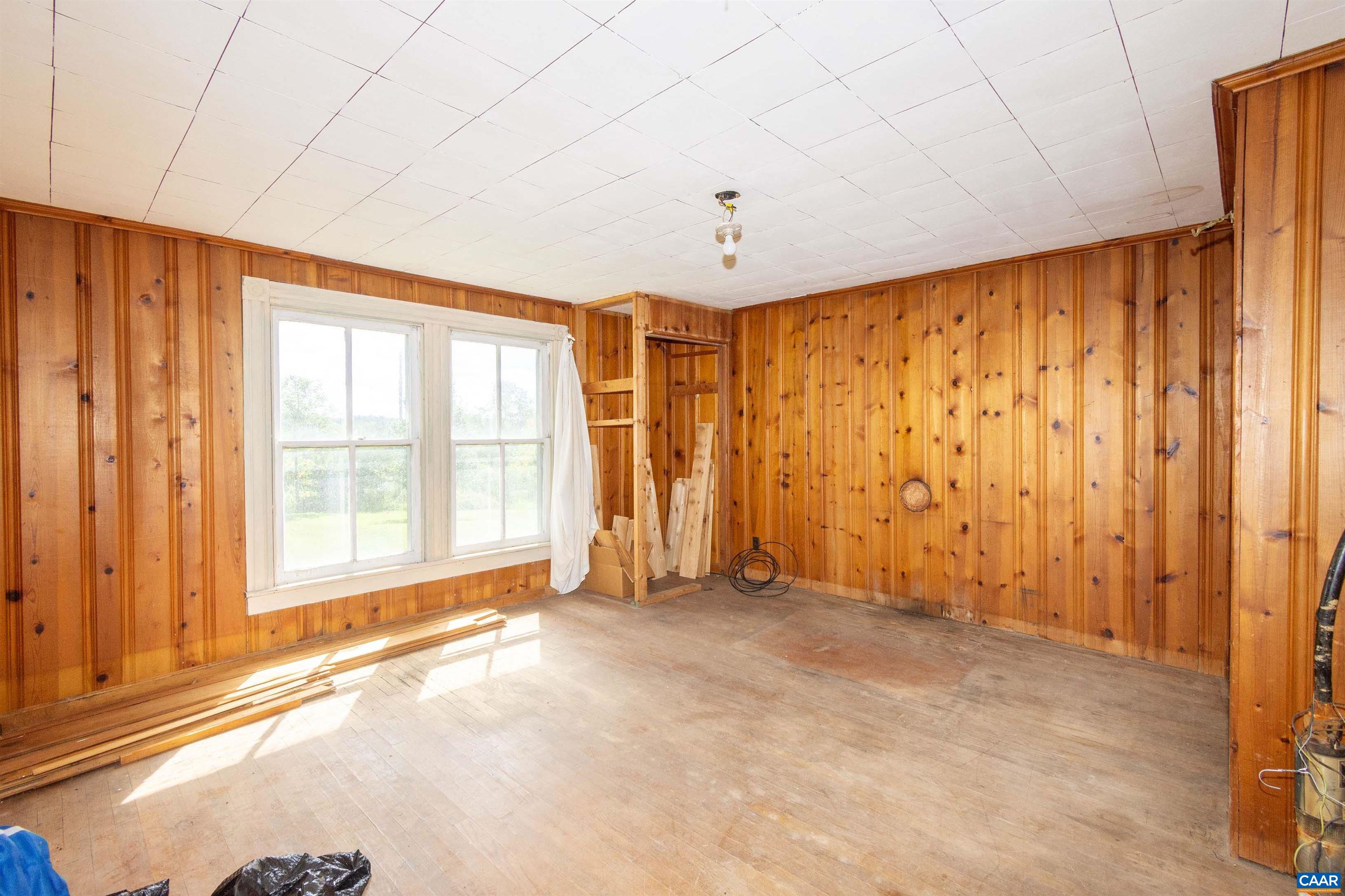 or Family Room, located at house front on left side.
