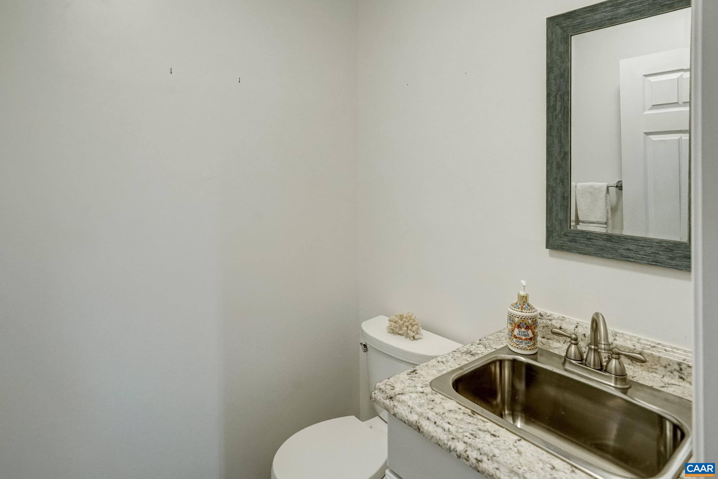 Half bathroom in basement. Half bathroom in basement.