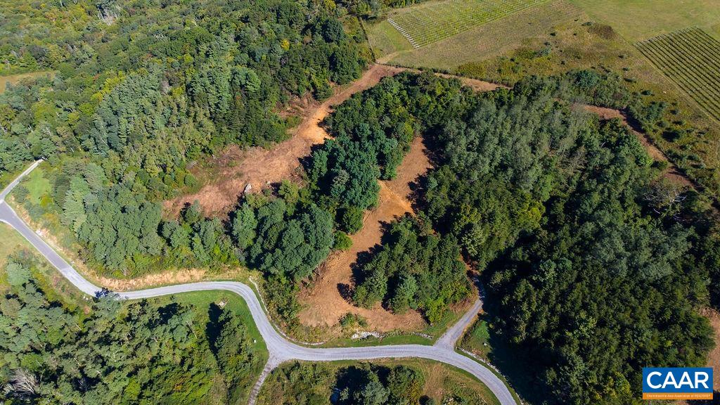 The Reserve's gravel road winding to the cleared sites. The Reserve's gravel road winding to the cleared sites.