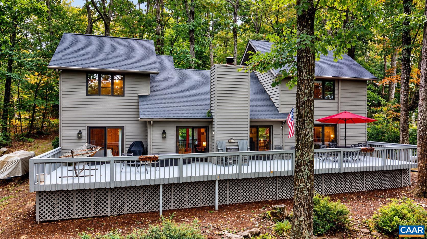 Enjoy the mountain lifestyle from this beautiful home, where peaceful surroundings and picturesque views toward the 5th fairway of Devils Knob Golf Course create a wonderful setting in every season.