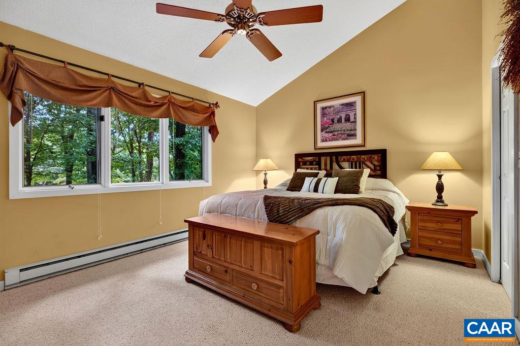 Spacious and private primary suite featuring a large primary bath and generous walk-in closet.