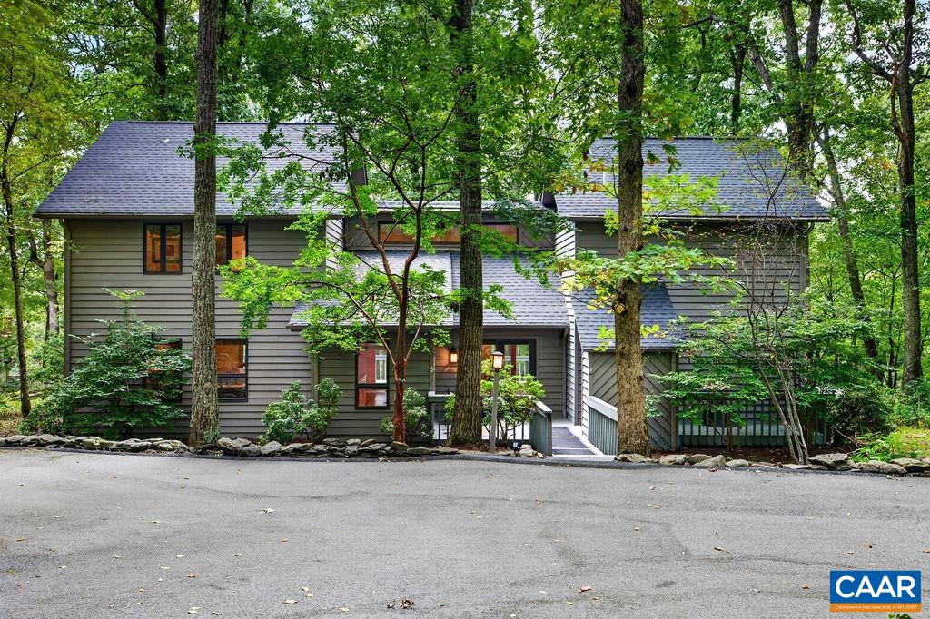 Tucked at the end of a peaceful cul-de-sac, the home offers a quiet and private mountain setting.