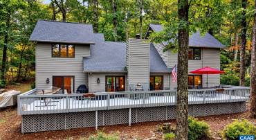 Enjoy the mountain lifestyle from this beautiful home, where peaceful surroundings and picturesque views toward the 5th fairway of Devils Knob Golf Course create a wonderful setting in every season.