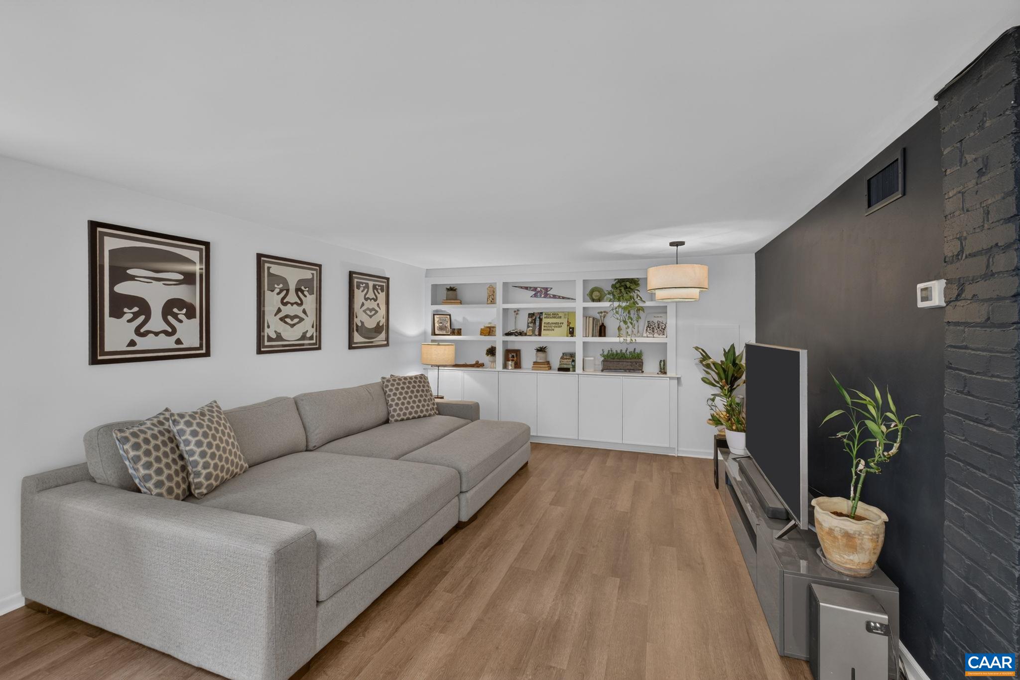 Step down into the spacious rec room. Step down into the spacious rec room.