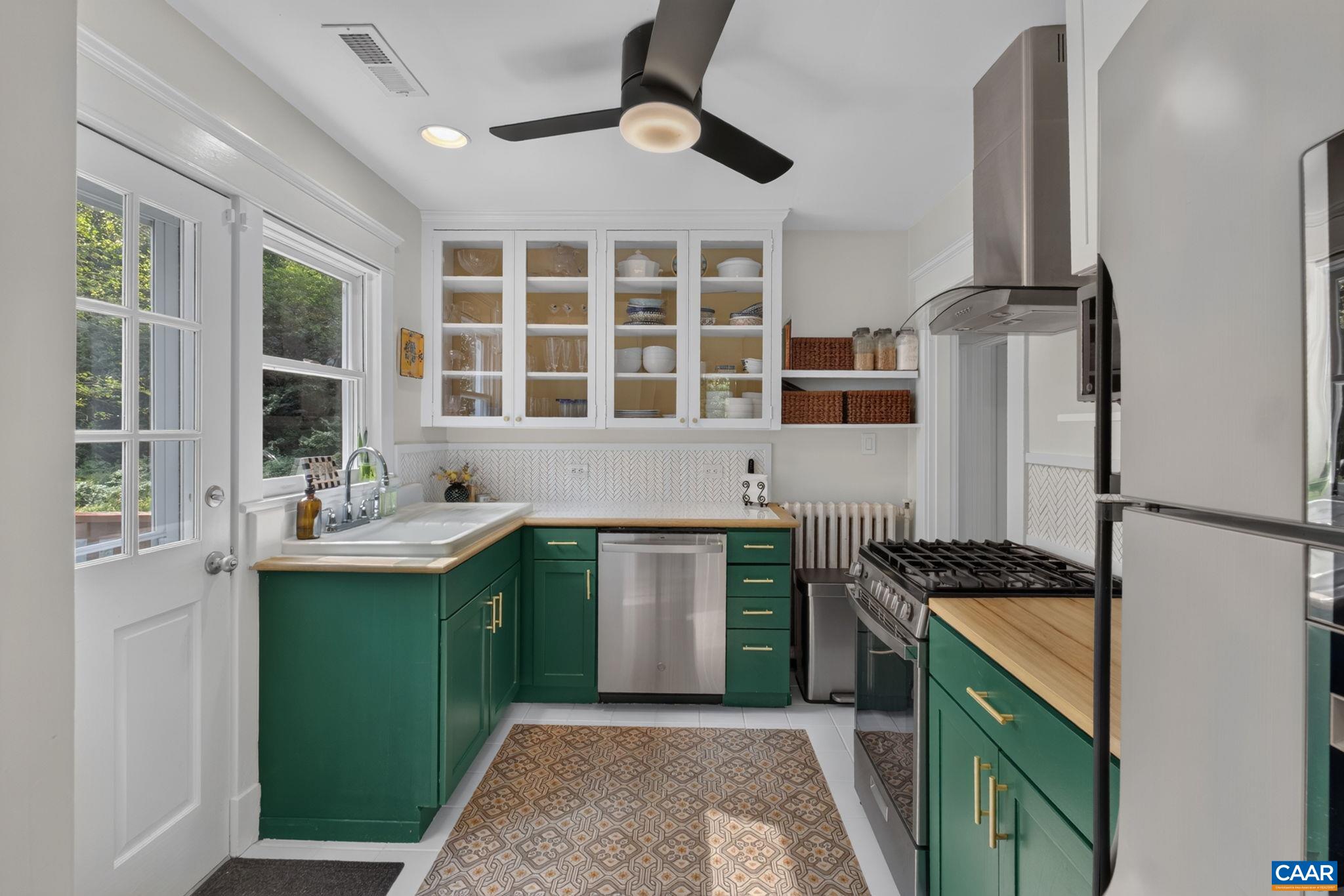 Step into the kitchen with custom painted cabinets. Step into the kitchen with custom painted cabinets.