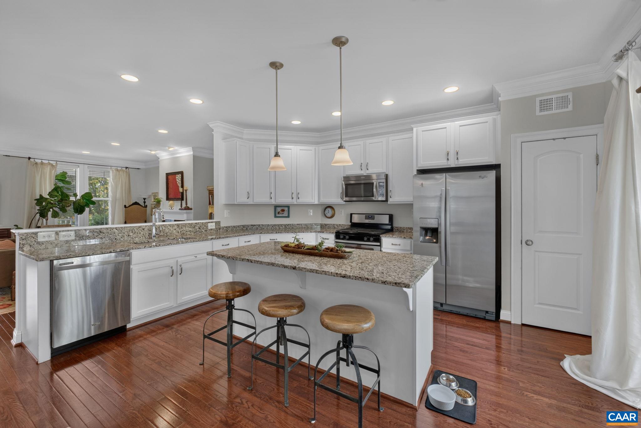 Stainless appliances, granite counters and large eating kitchen island. Stainless appliances, granite counters and large eating kitchen island.
