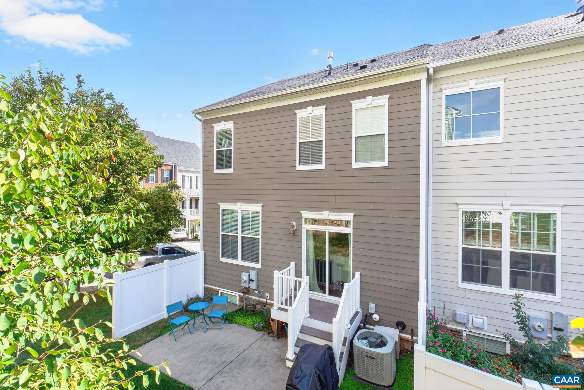 Rear of home with patio. Rear of home with patio.