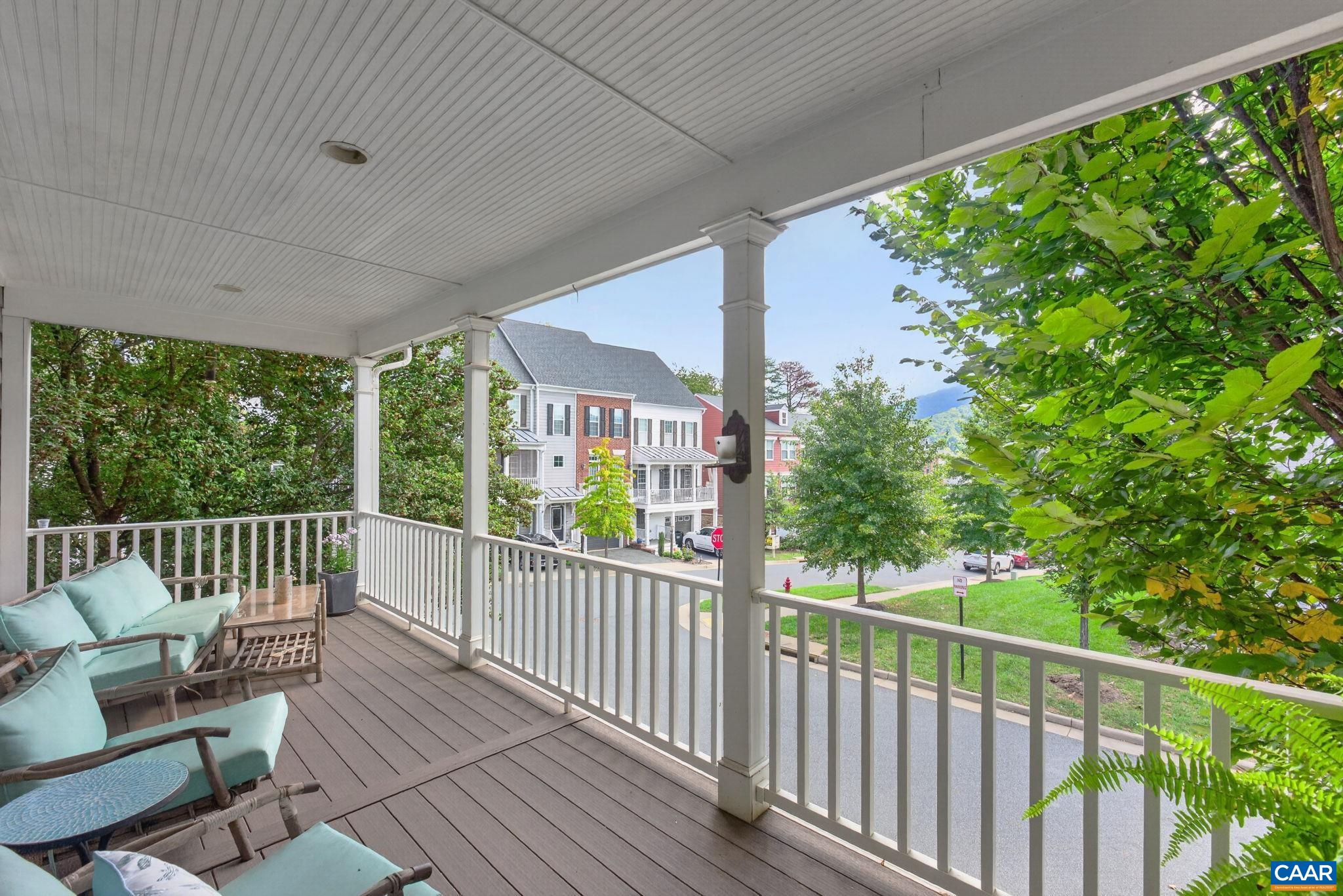 Wide and deep covered front porch with wonderful views of Carter Mountain. Wide and deep covered front porch with wonderful views of Carter Mountain.