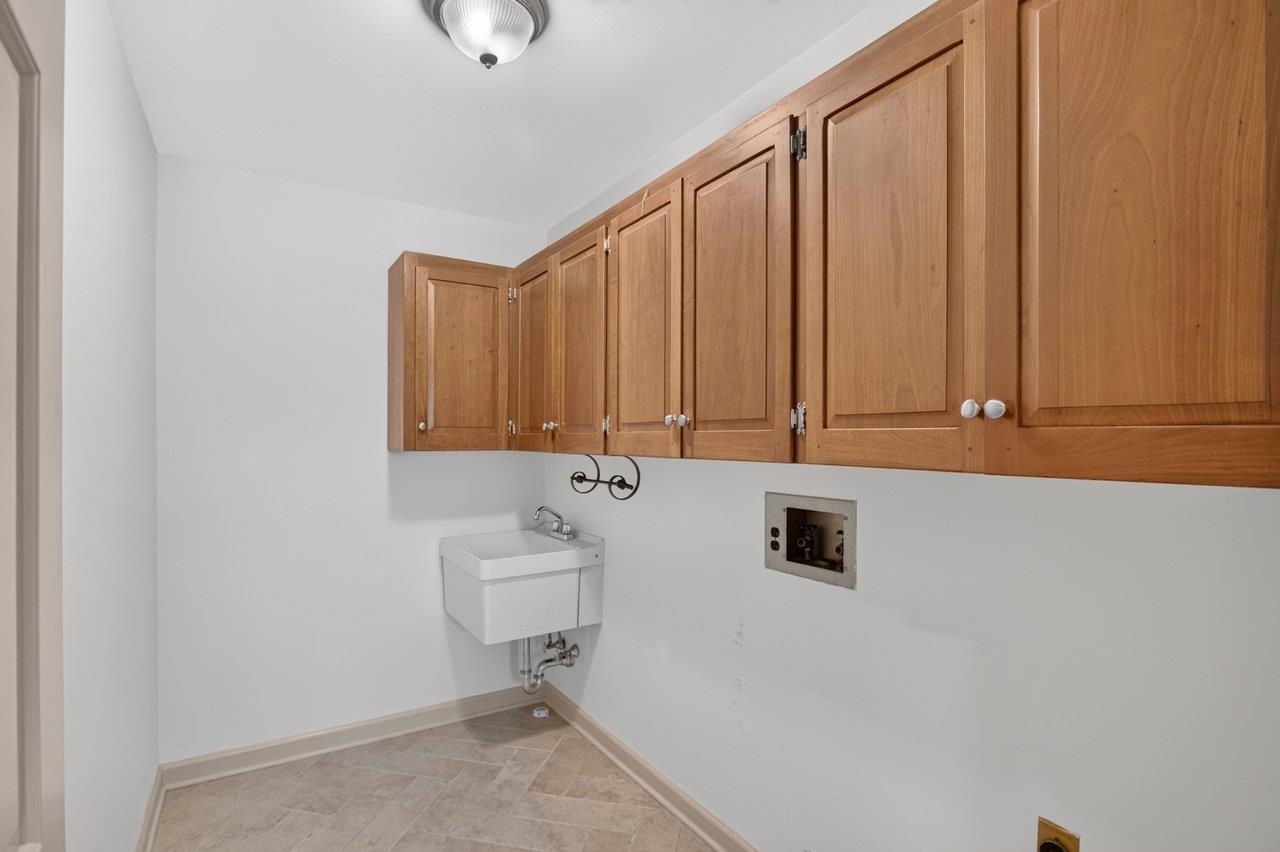 Tile floor, sink and great storage