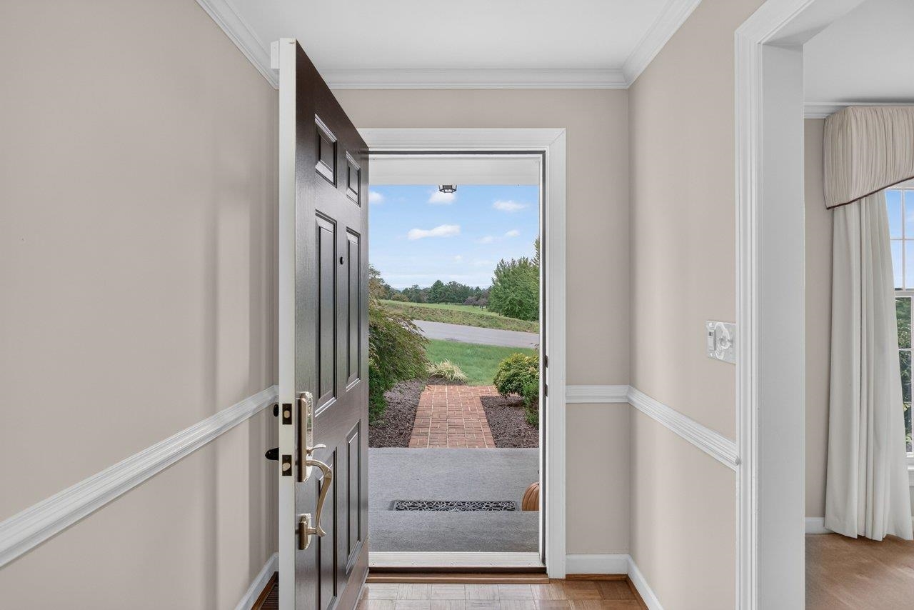 The front door opens out to golf course and mountain views