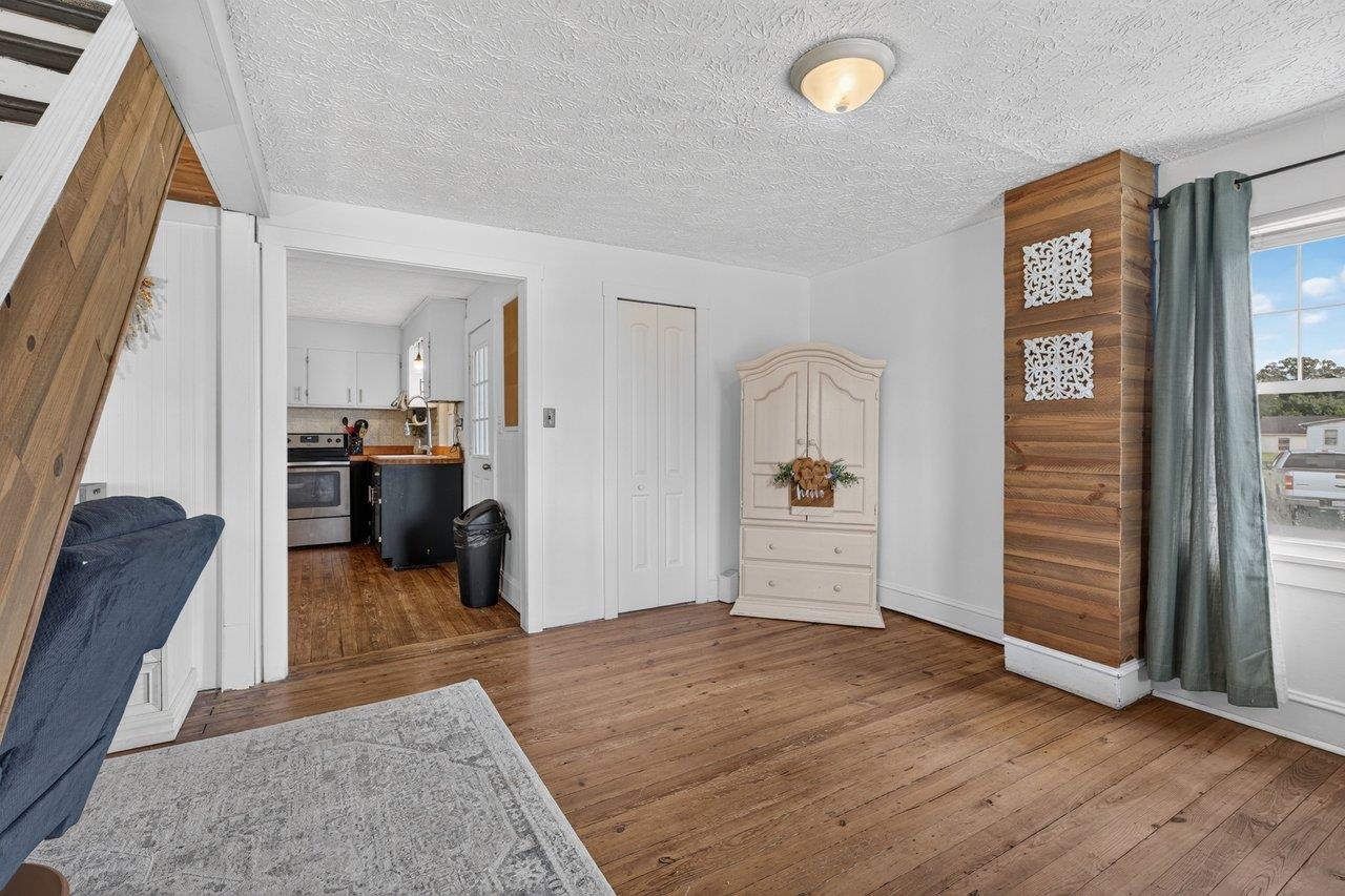 Good-sized dining room with hardwood floors, conveniently located off the kitchen and offering versatile space. Good-sized dining room with hardwood floors, conveniently located off the kitchen and offering versatile space.
