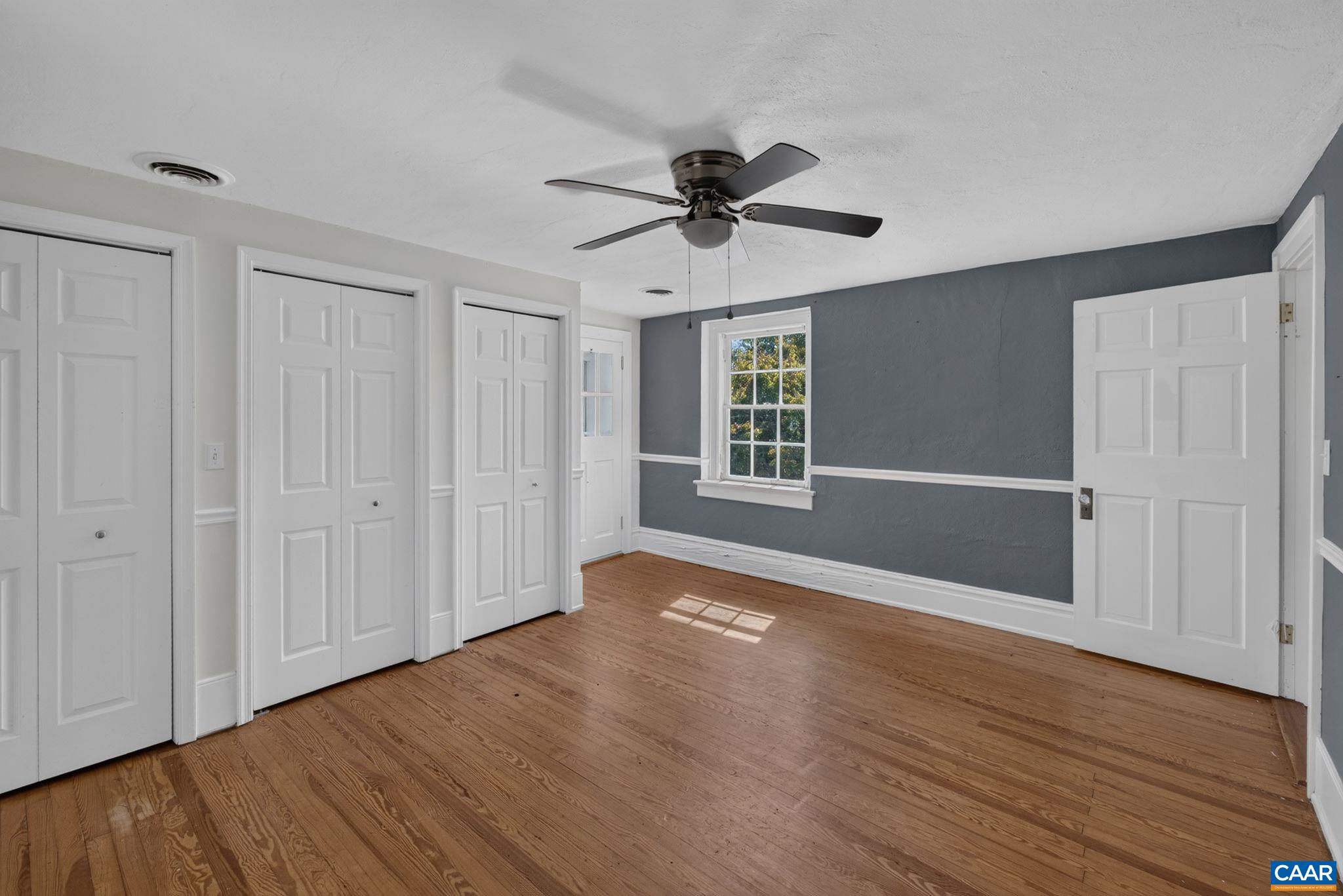 Upstairs bedroom with built-ins. Upstairs bedroom with built-ins.