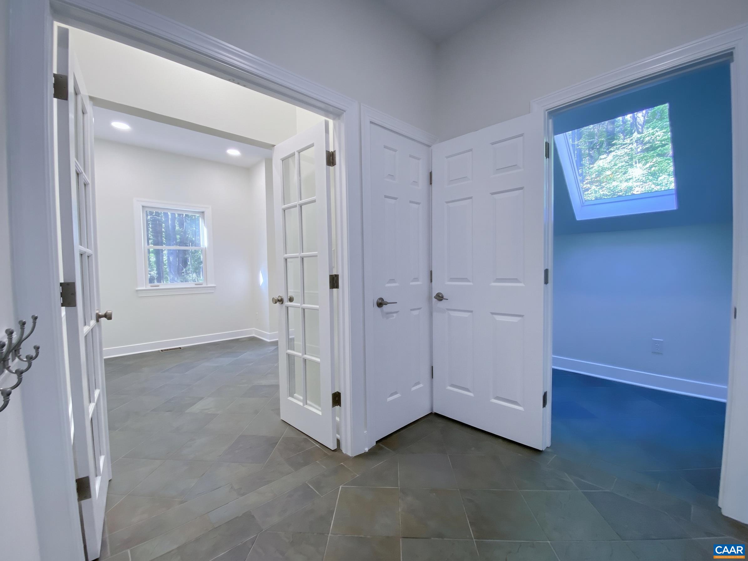 Awesome space! Walking in from garage, laundry room to the left, huge walk in closet for boots, garding supplies etc...