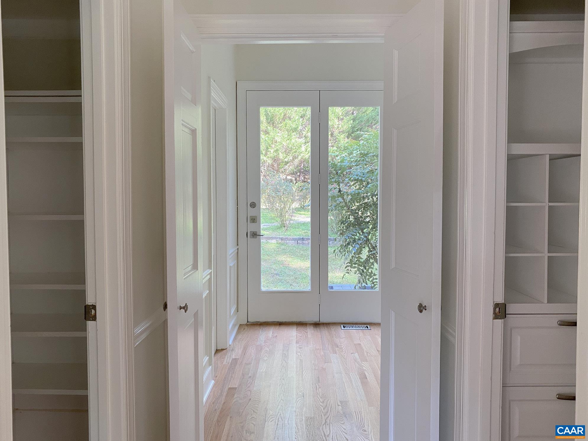 Primary en-suite has his and hers walk-in closets
