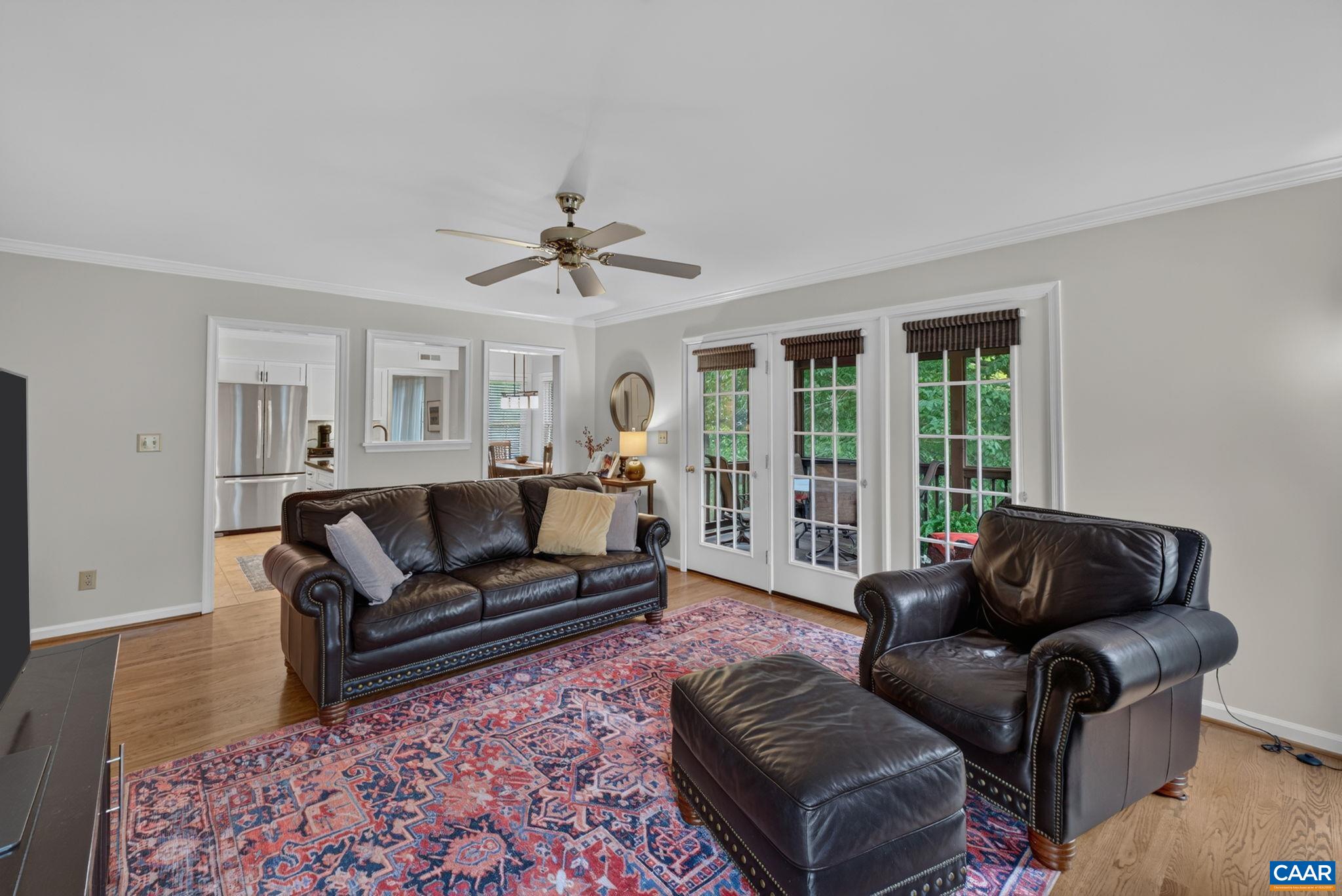 Family room with doors to the screen porch.