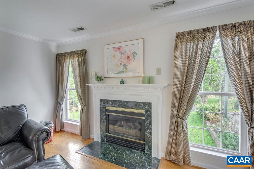 Marble surround gas fireplace.