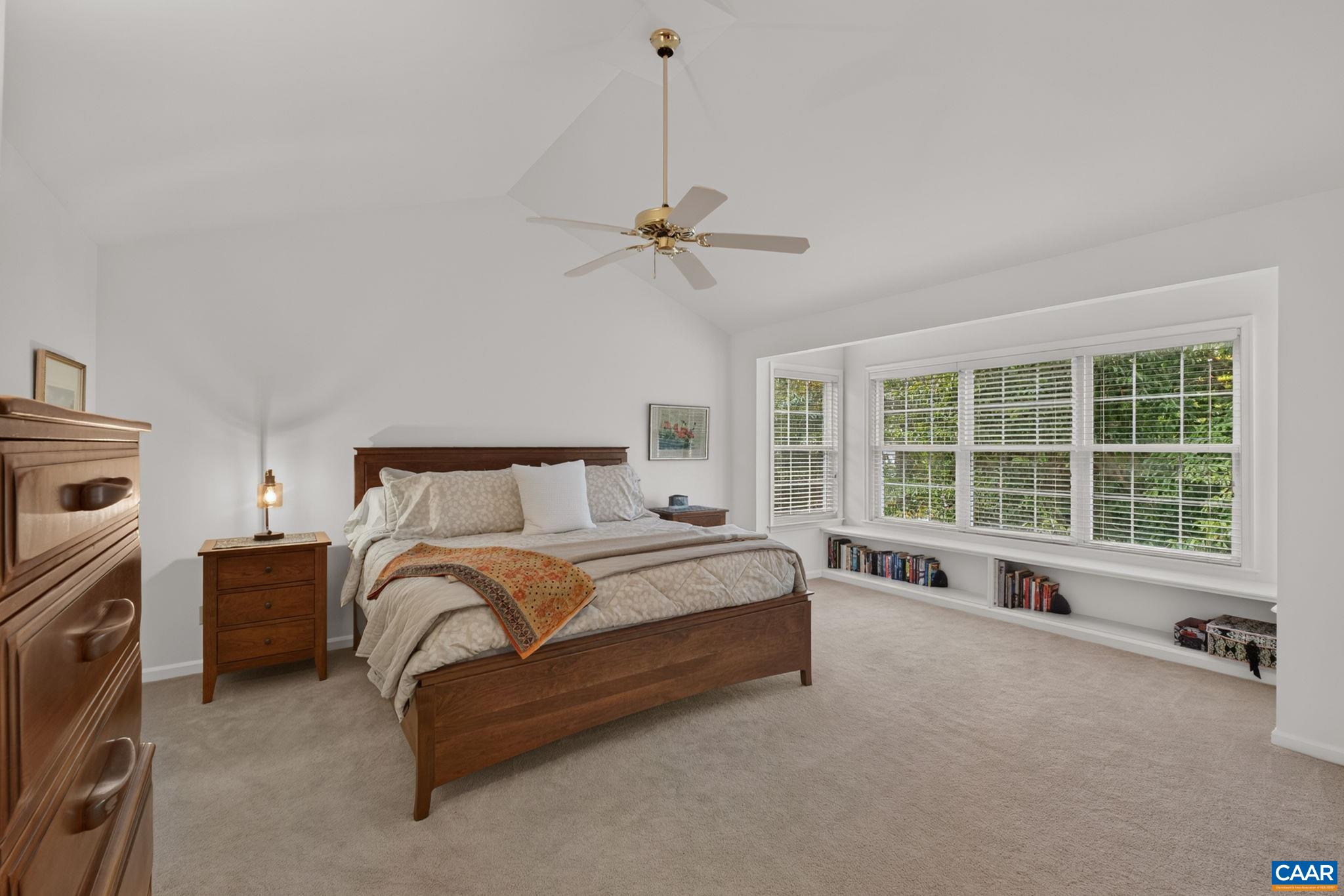Large primary bedroom with built-ins.