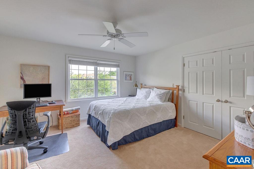 One of three additional upstairs bedrooms.