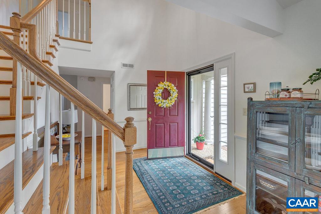 Soaring foyer upon entering the home.